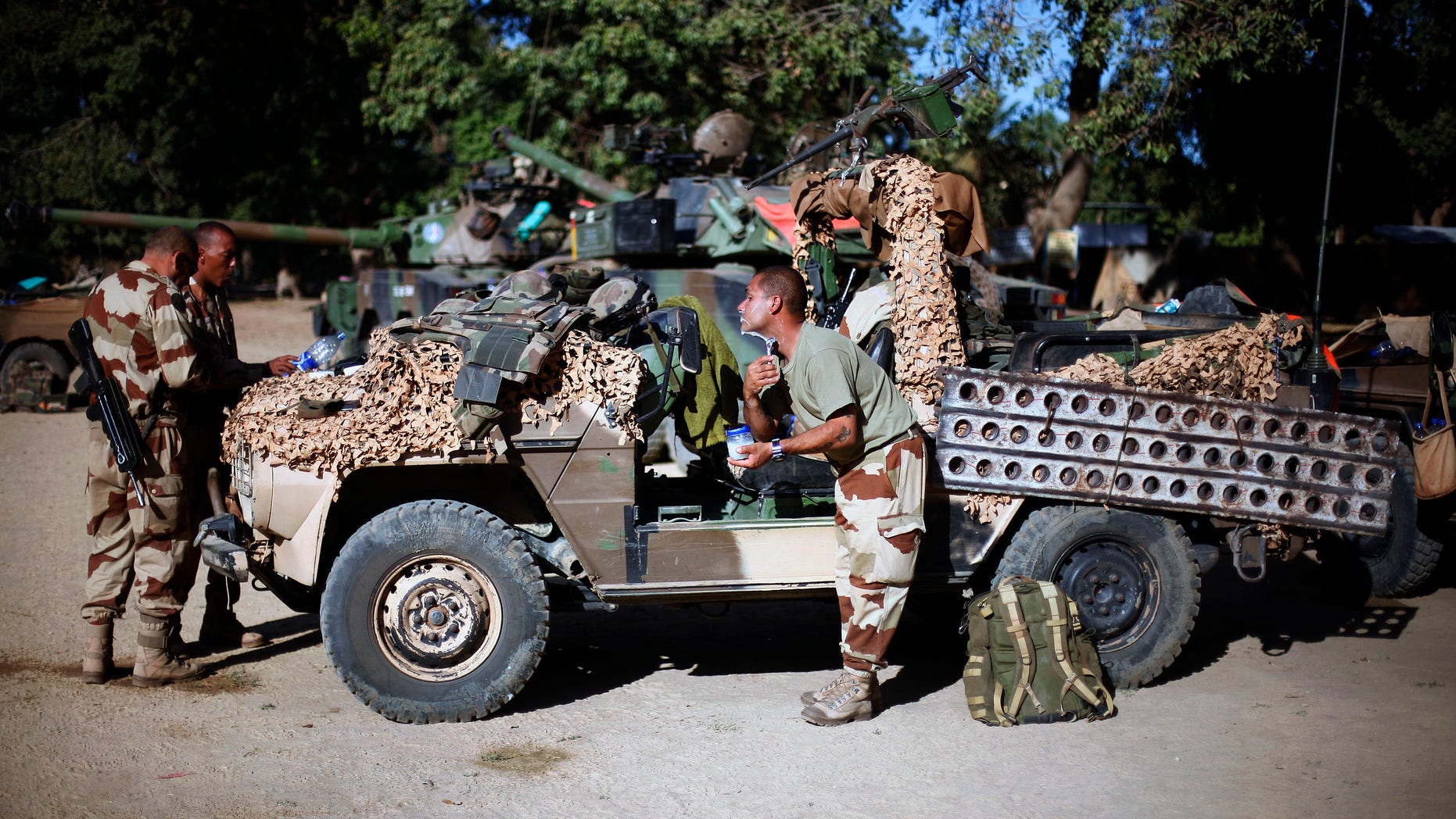 Jan. 20, 2013: French foreign legionnaires get ready in Niono, some 249 miles north of the capital Bamako. The Malian military announced late Saturday that the government was now controlling Diabaly, marking an important accomplishment for the French-led offensive to oust the extremists from northern and central Mali.