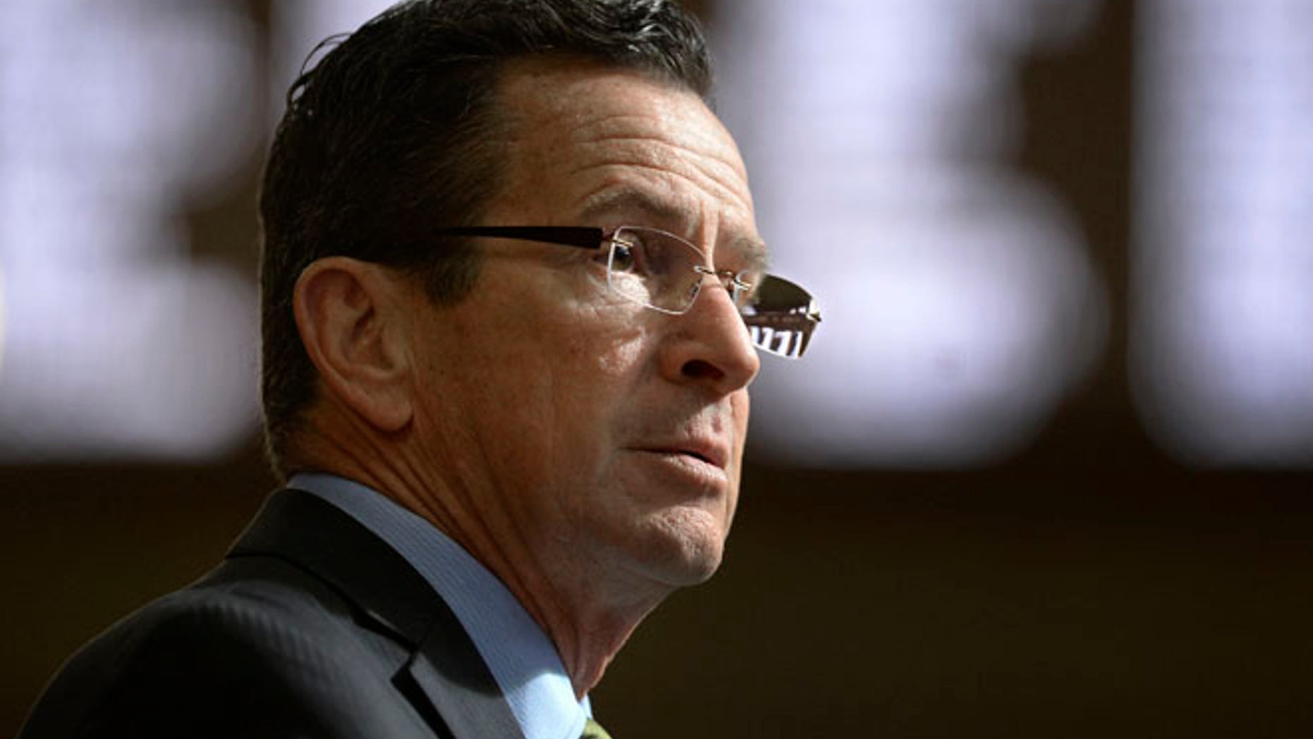 FILE- In this Feb. 8, 2017, file photo, Connecticut Gov. Dannel P. Malloy delivers his budget address to members of the house and senate inside the Hall of the House at the state Capitol in Hartford, Conn. Malloy made a last-ditch attempt Wednesday, June 28, to persuade leaders of the state House of Representatives to pass the three-month mini budget he crafted and avoid what will be deep cuts to everything from youth summer jobs and rental assistance programs. (AP Photo/Jessica Hill, File)