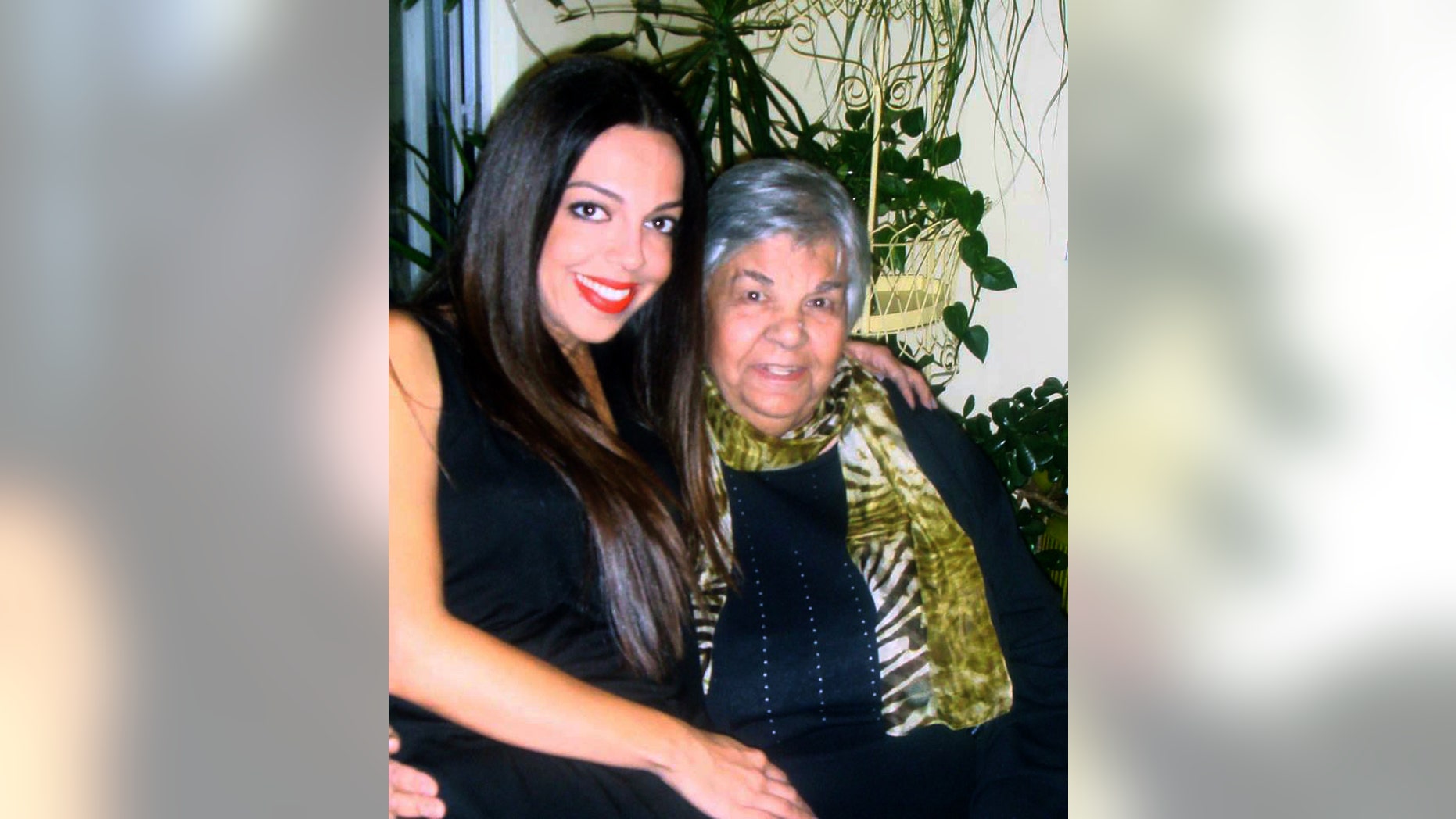 Lisa Daftari (L) and her grandmother.