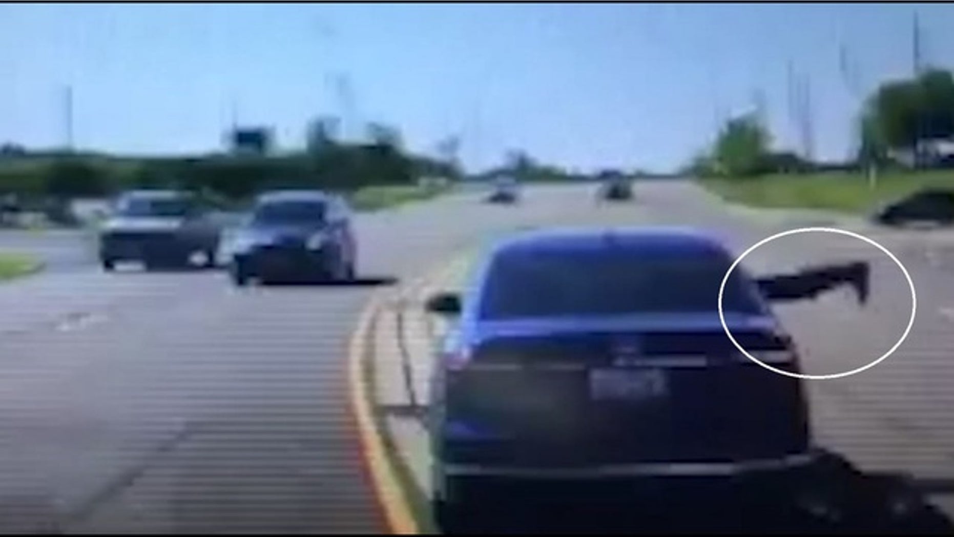 Police video showed the man jump through the passenger's side window in Dixon, Illinois.