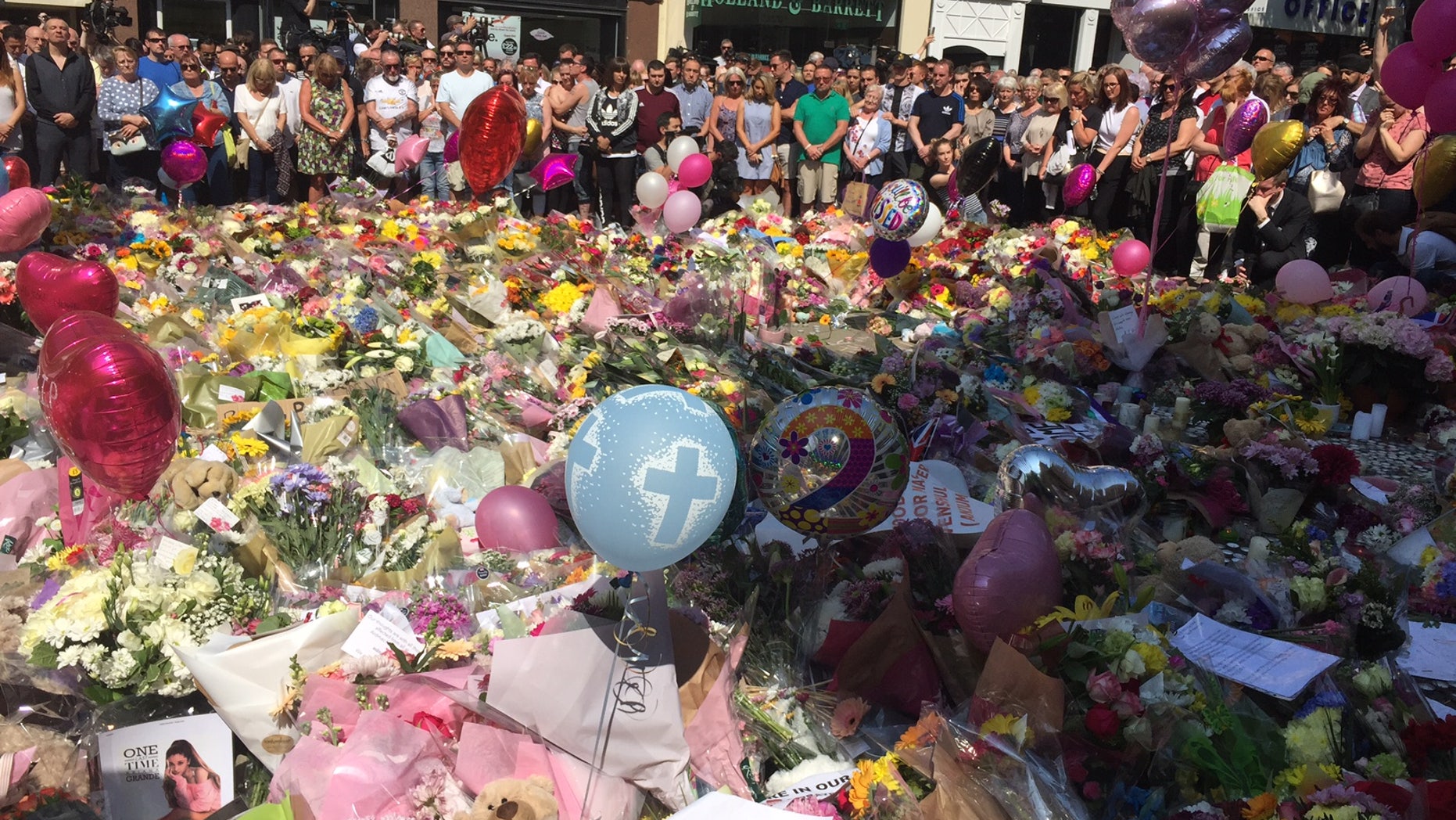 The shooting unfolded more than a year after the terror attack at Manchester arena, which led to tributes seen here.
