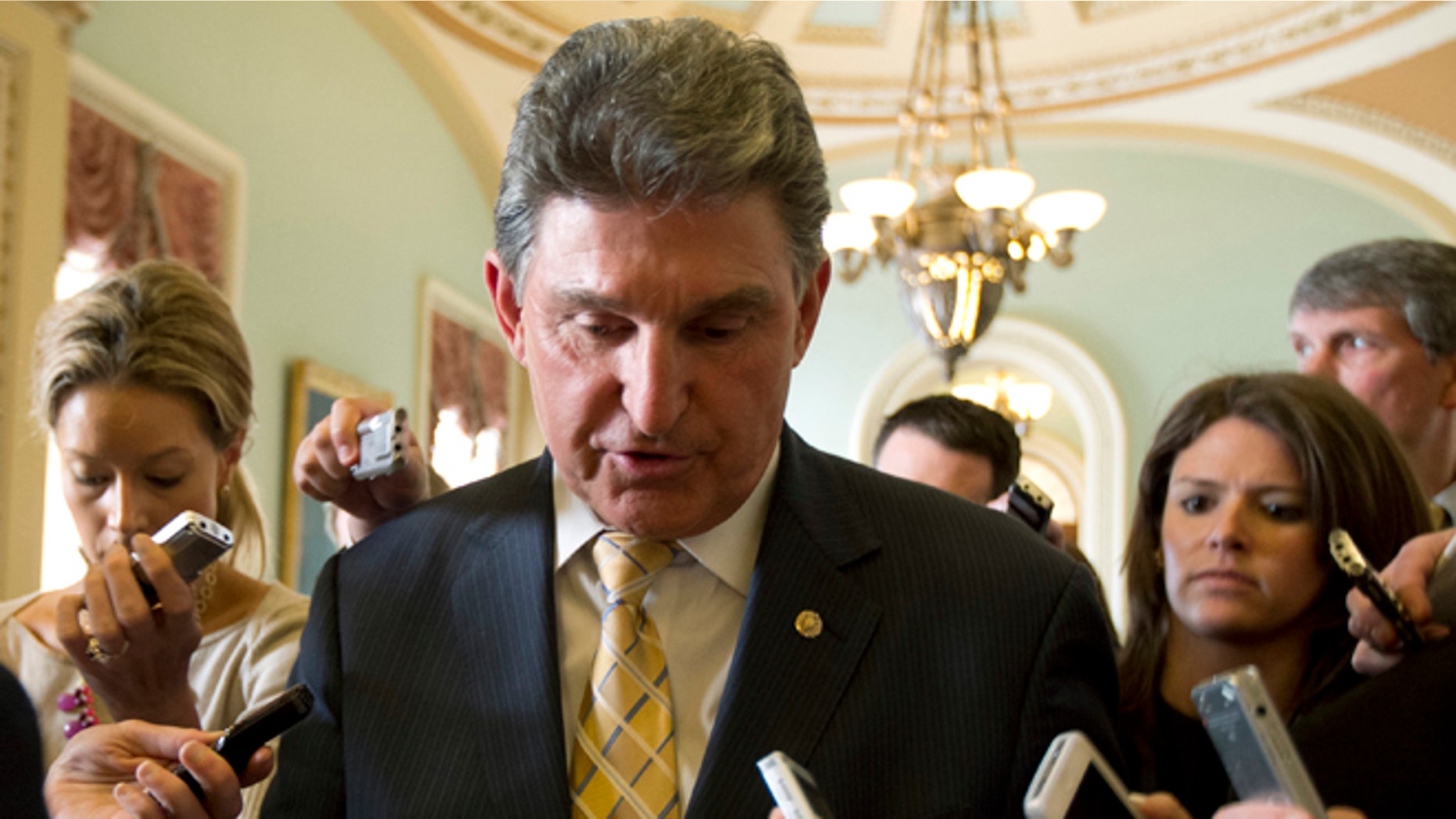 FILE: April 9, 2013: Sen. Joe Manchin, D-W.Va., on Capitol Hill, in Washington, D.C.