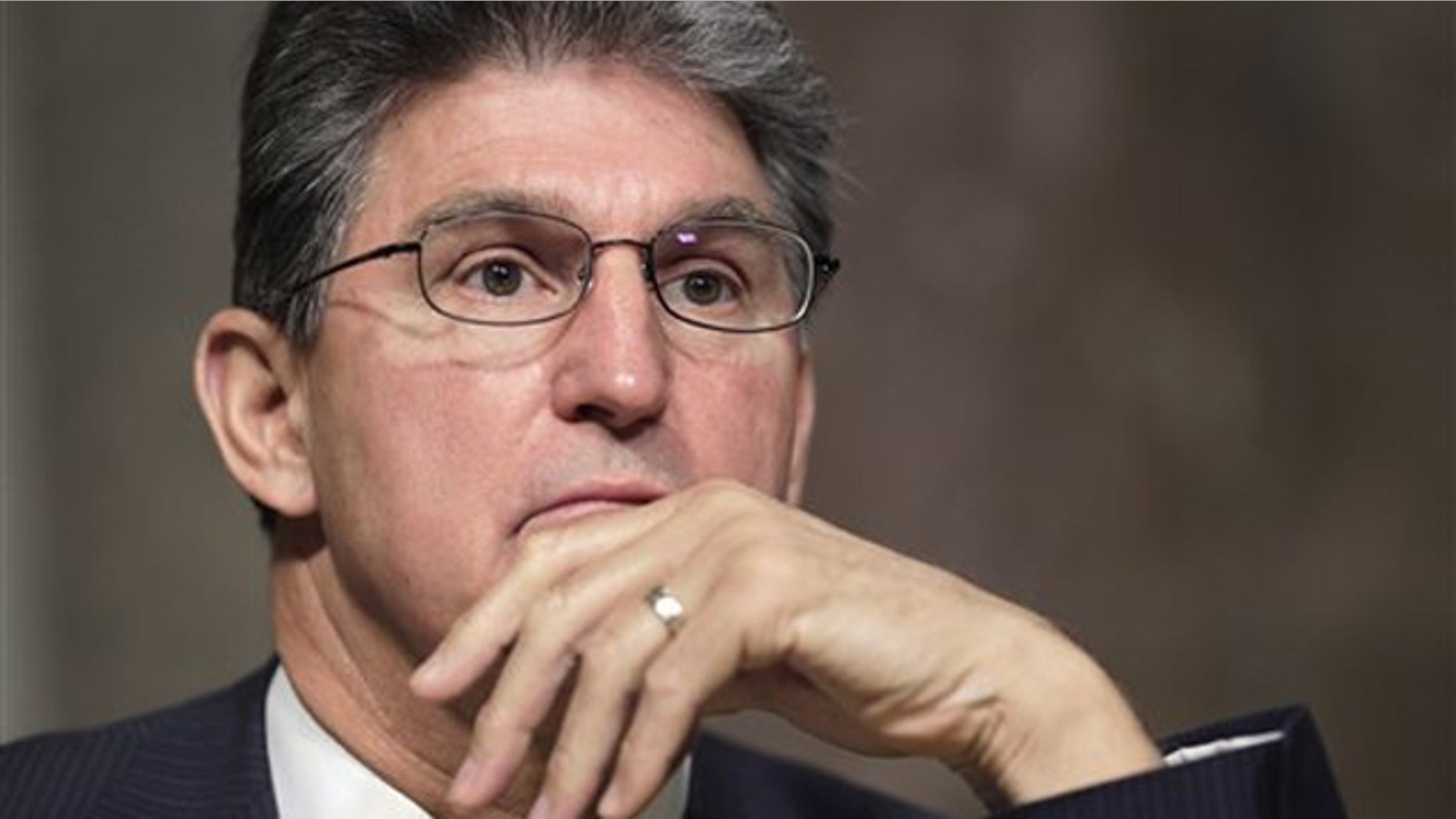 Sen. Joe Manchin listens to testimony on Capitol Hill March 29 during a hearing on Libya.