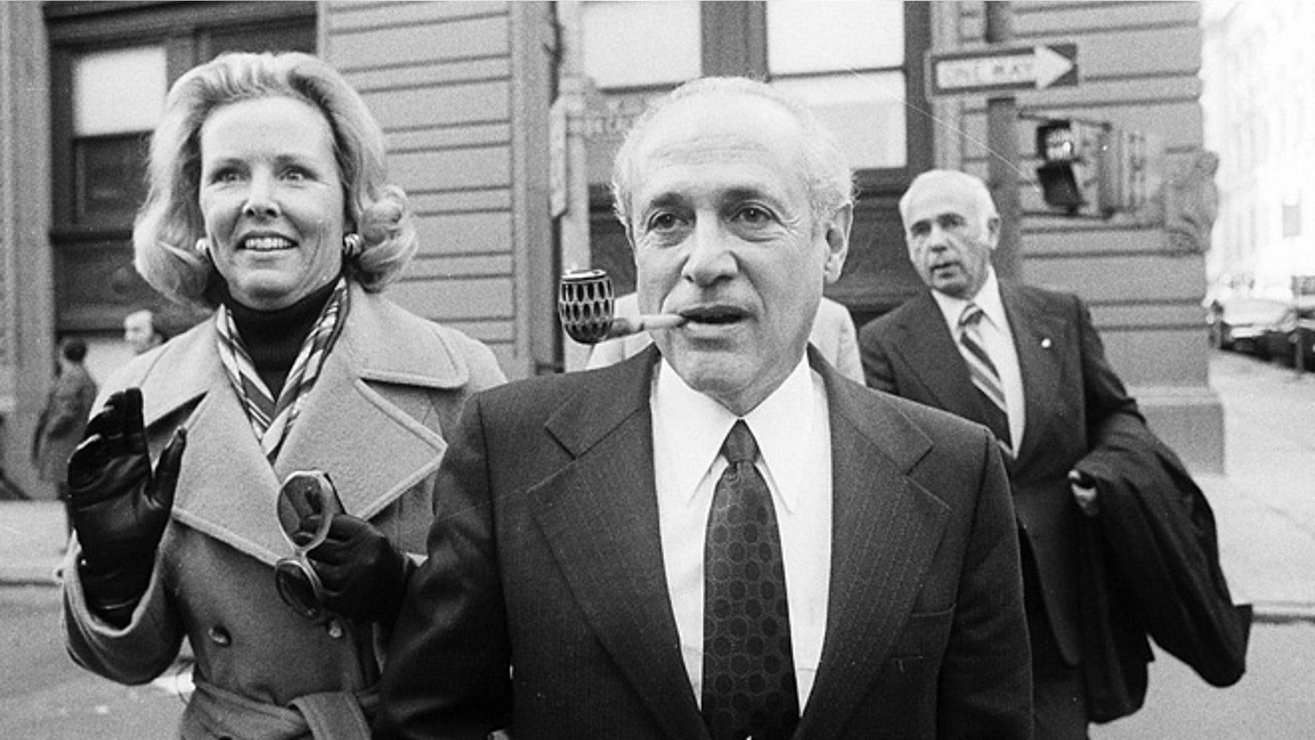 File-This Oct. 6, 2001, file photo shows Gov. Marvin Mandel, accompanied by his wife, Jeanne, walking to the federal courthouse in Baltimore.