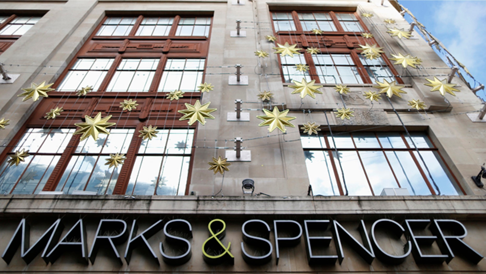 Nov. 5, 2013: Christmas decorations adorn the exterior of retailer Marks and Spencer's flagship store in London's West End.