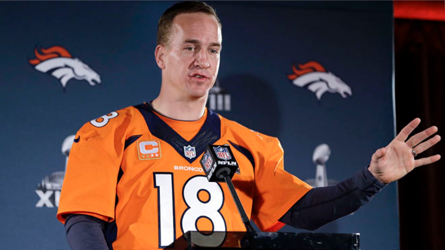 Jan 30, 2014: Denver Broncos quarterback Peyton Manning talks with reporters during a news conference in Jersey City, N.J.