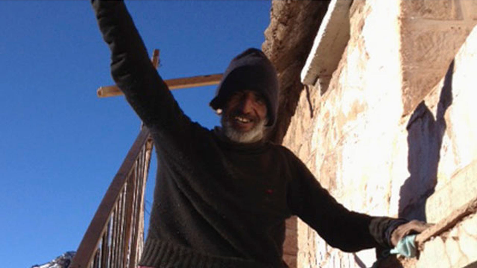 Sept, 8, 2013: Uruguayan man Raul Fernando Gomez Circunegui, 58, poses outside the shelter where he was found after disappearing four months ago in the remote Andes Mountains of San Juan Province.