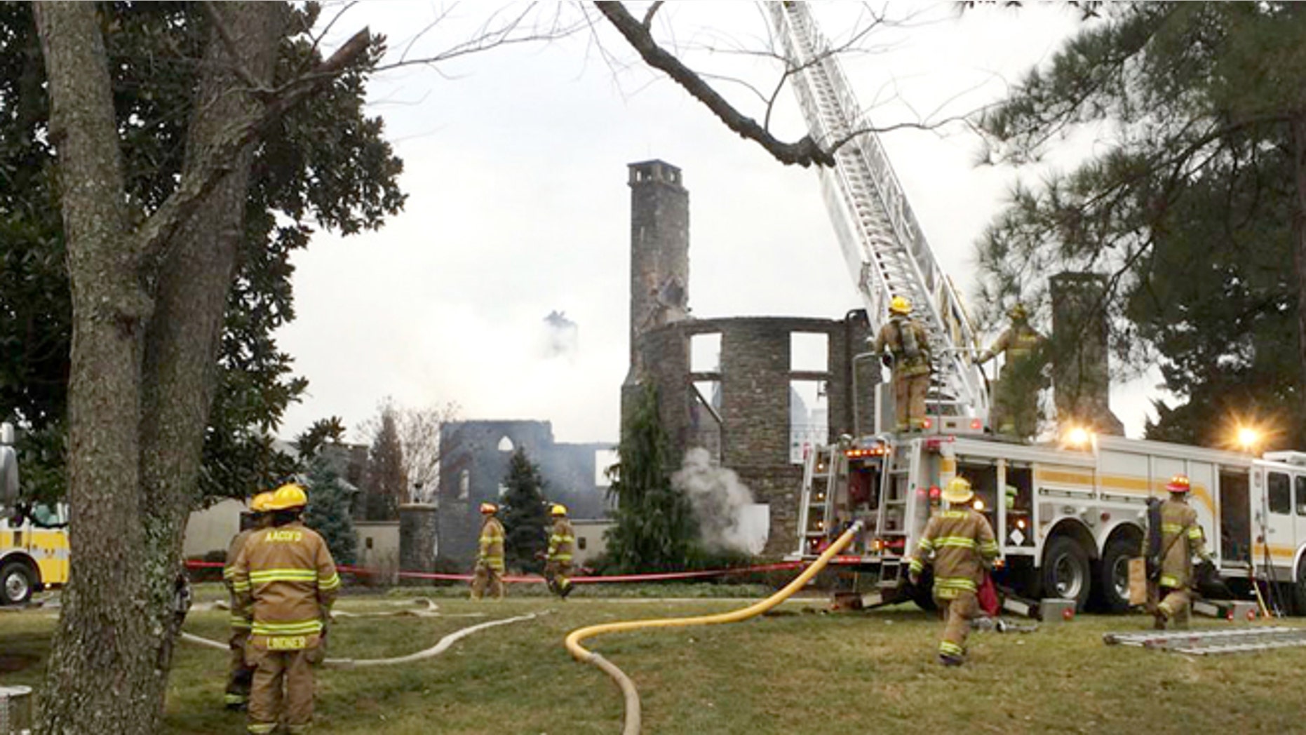 Jan. 19, 2015: Firefights work to put out a fire at a home on Childs Point Road, in Annapolis, Md.