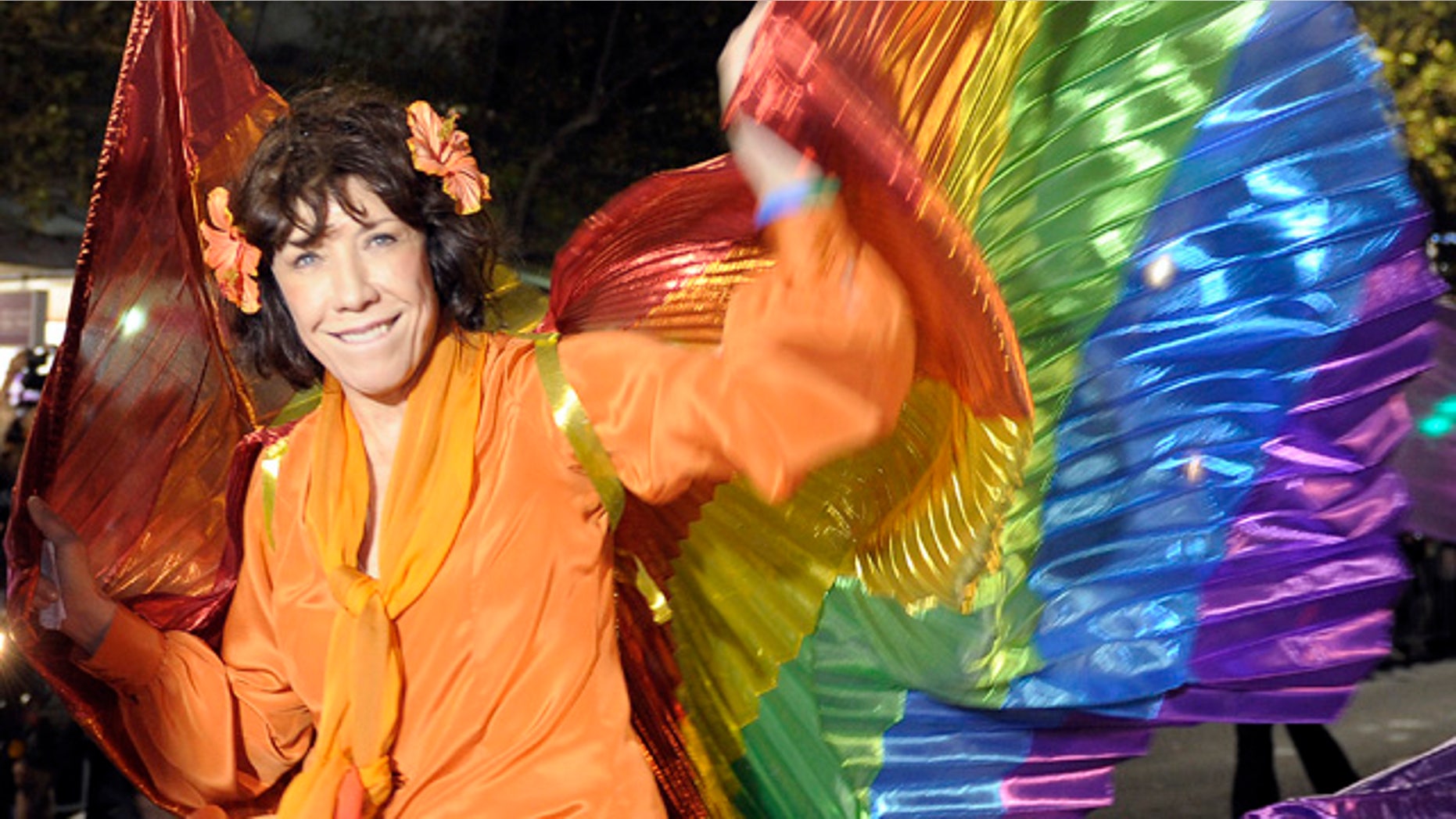 March 5: Hollywood star Lily Tomlin reacts as she takes part in the 2011 Gay and Lesbian Mardi Gras in Sydney, Australia. (AP)