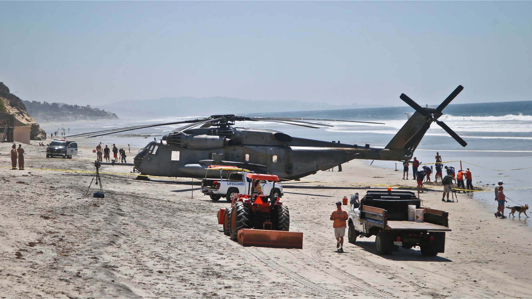 April 15, 2015: A Marine Corps helicopter sits in the sand where it made an emergency landing.
