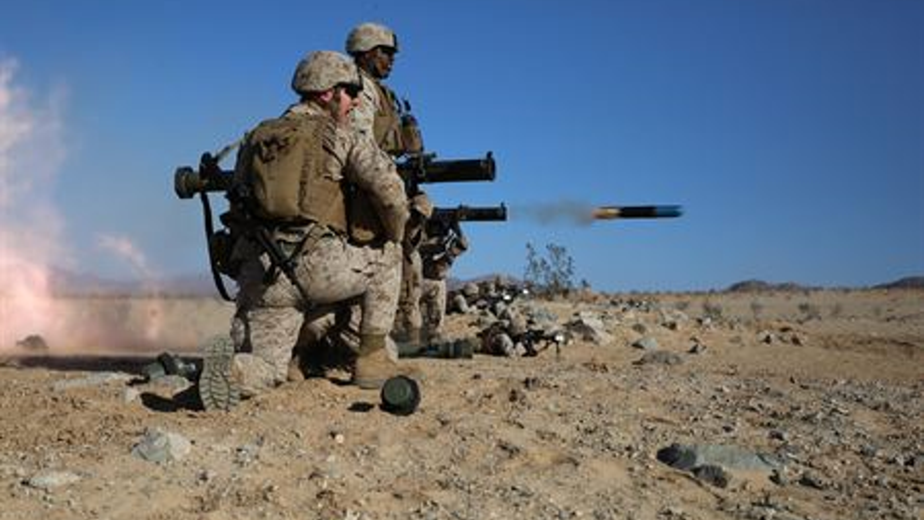 Anti-tank missileman fires the MK153 shoulder-launched multipurpose assault weapon (SMAW) during the enemy counter attack portion of a Marine Corps Operational Test and Evaluation Activity assessment at Marine Corps Air Ground Combat Center, Twentynine Palms, March 7, 2015. (U.S. Marine Corps photo by Sgt. Alicia R. Leaders/Released)