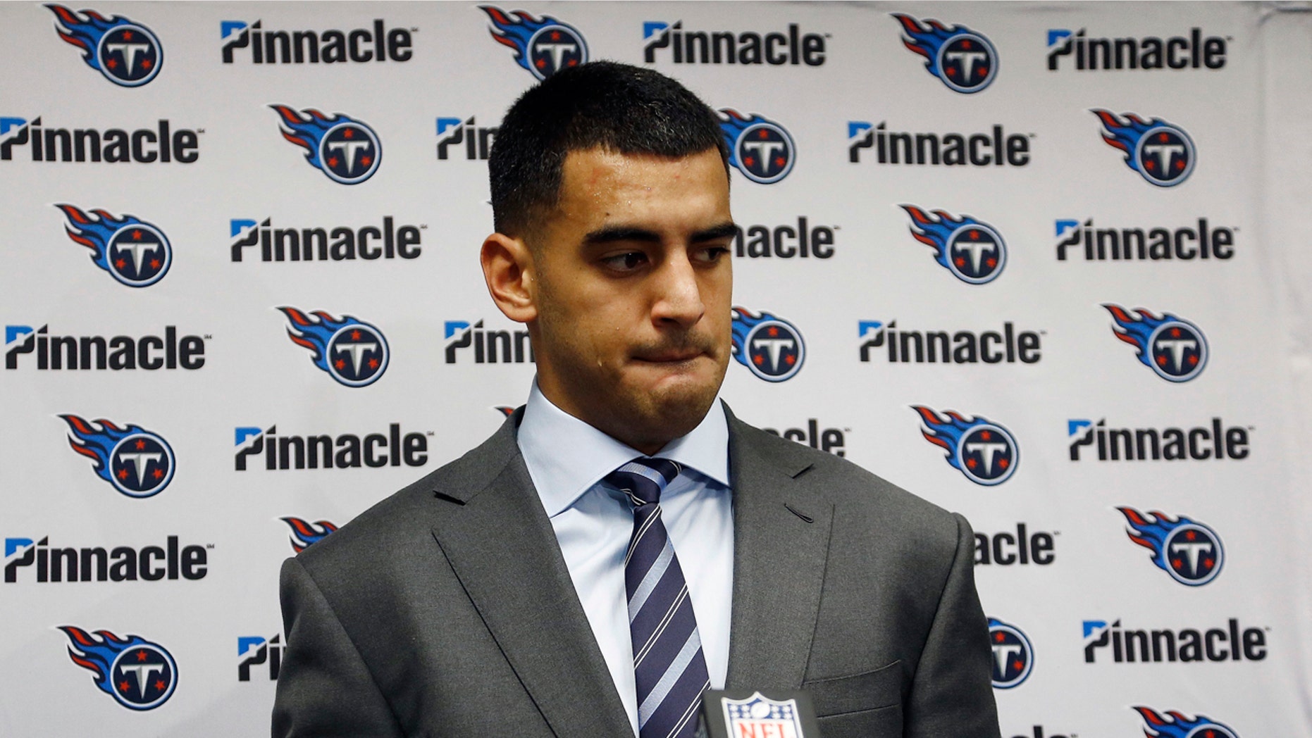 Tennessee Titans quarterback Marcus Mariota listens to a question during a news conference after a difficult loss against the Arizona Cardinals on Dec. 10, 2017.