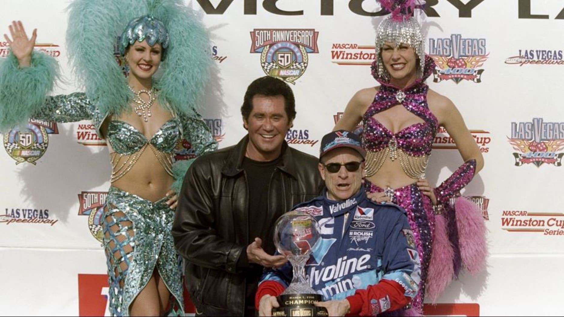 28 Feb 1998: Mark Martin celebrates after winning the Las Vegas 400 at the Las Vegas Motor Speedway in Las Vegas, Nevada. Mandatory Credit: David Taylor /Allsport