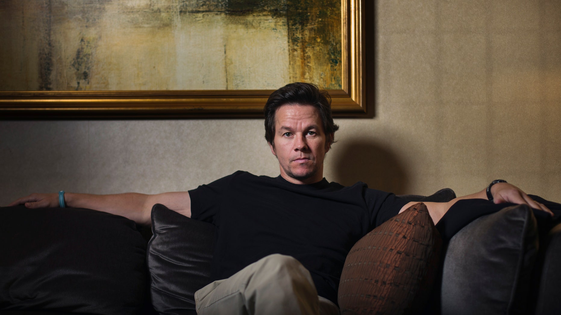 December 5, 2013. Actor Mark Wahlberg poses for a portrait while promoting the film "Lone Survivor" in New York. The film is based on the memoir by former U.S. Navy SEAL Marcus Luttrell about the failed 2005 mission "Operation Red Wings" in Afghanistan.