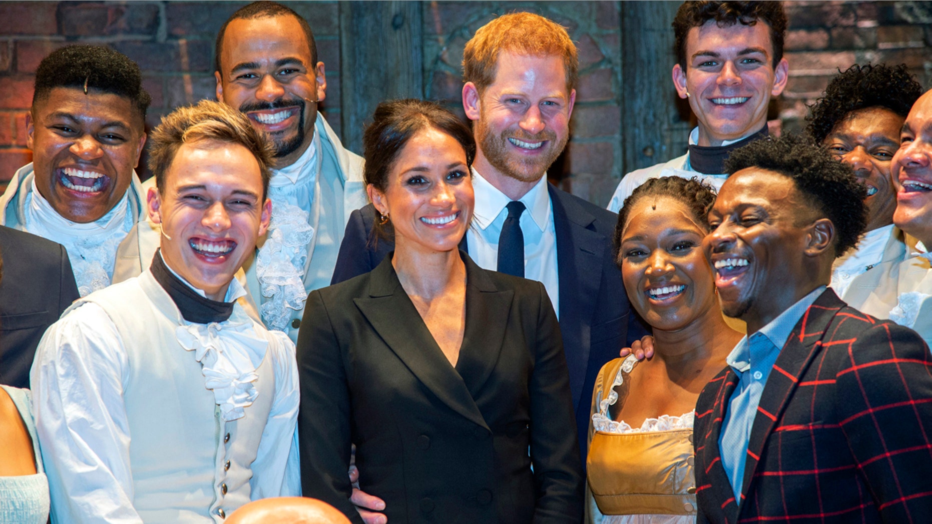 Britain's Prince Harry and Meghan, Duchess of Sussex meet the cast after a gala performance of the musical Hamilton, in support of the charity Sentebale, at the Victoria Palace Theatre in London, Wednesday, Aug. 29 2018.