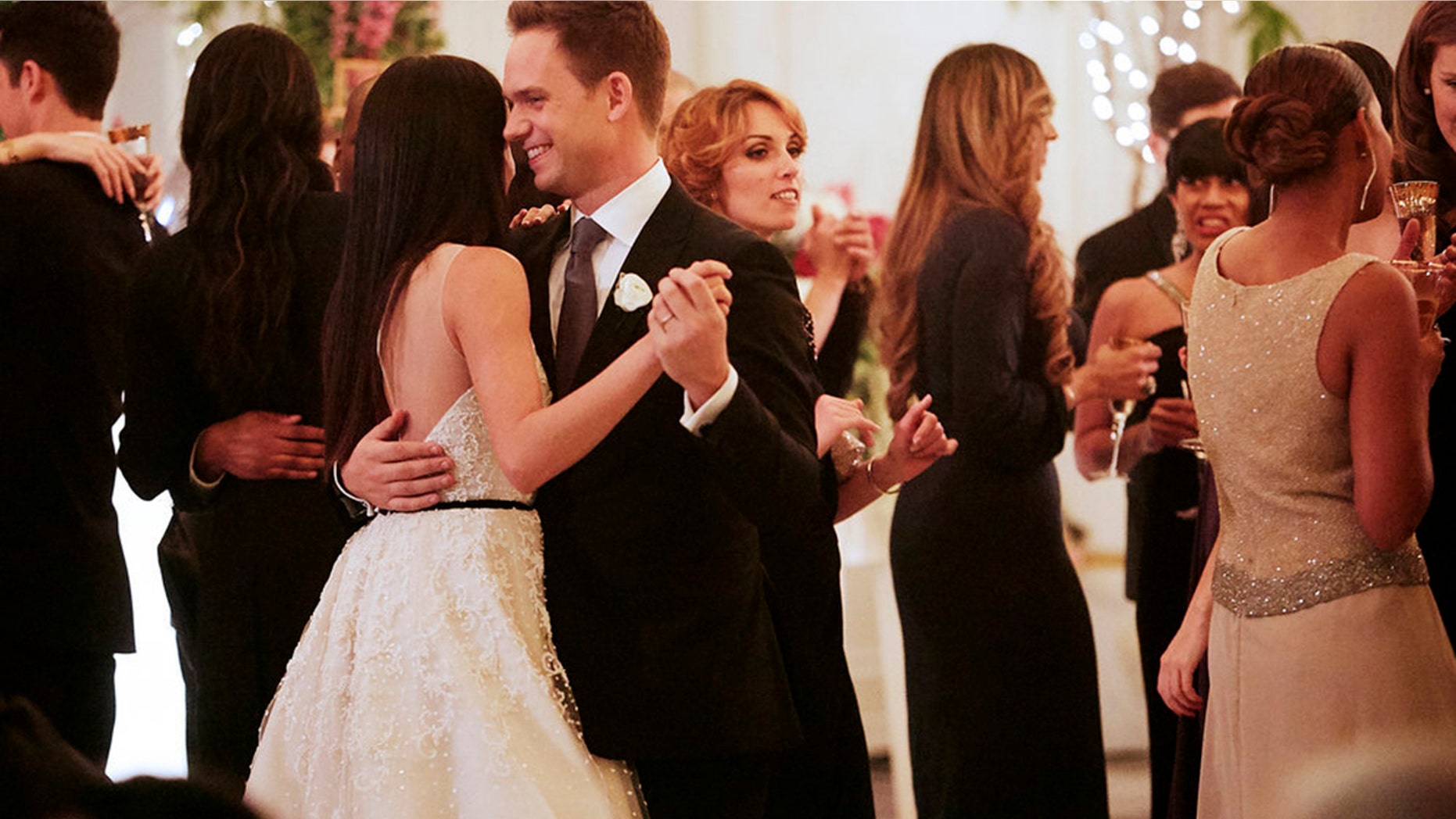 Meghan Markle (left) as Rachel and Patrick J. Adams as Mike in the Season 7 finale of "Suits."