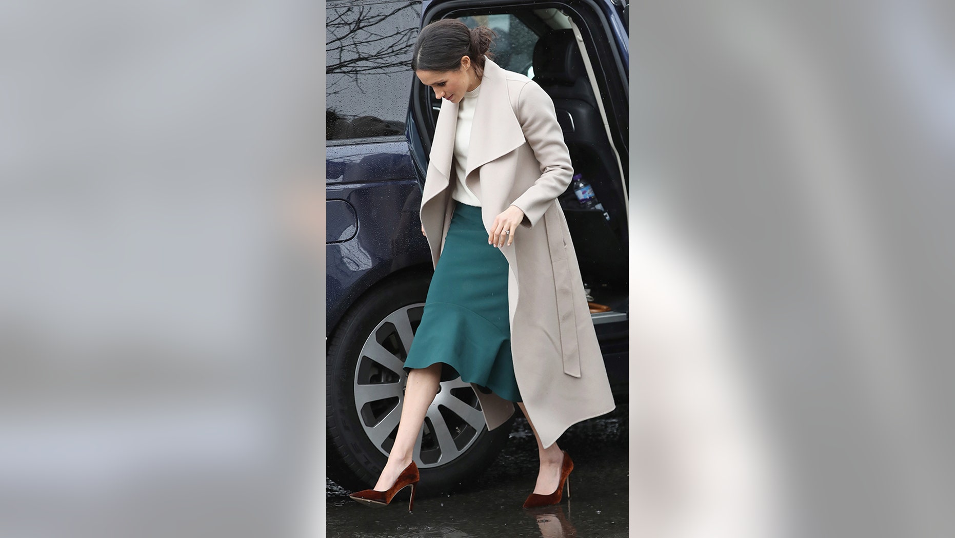 Markle paired a $750 Mackage coat with a pair of velvet Jimmy Choos during a March visit to Northern Ireland.