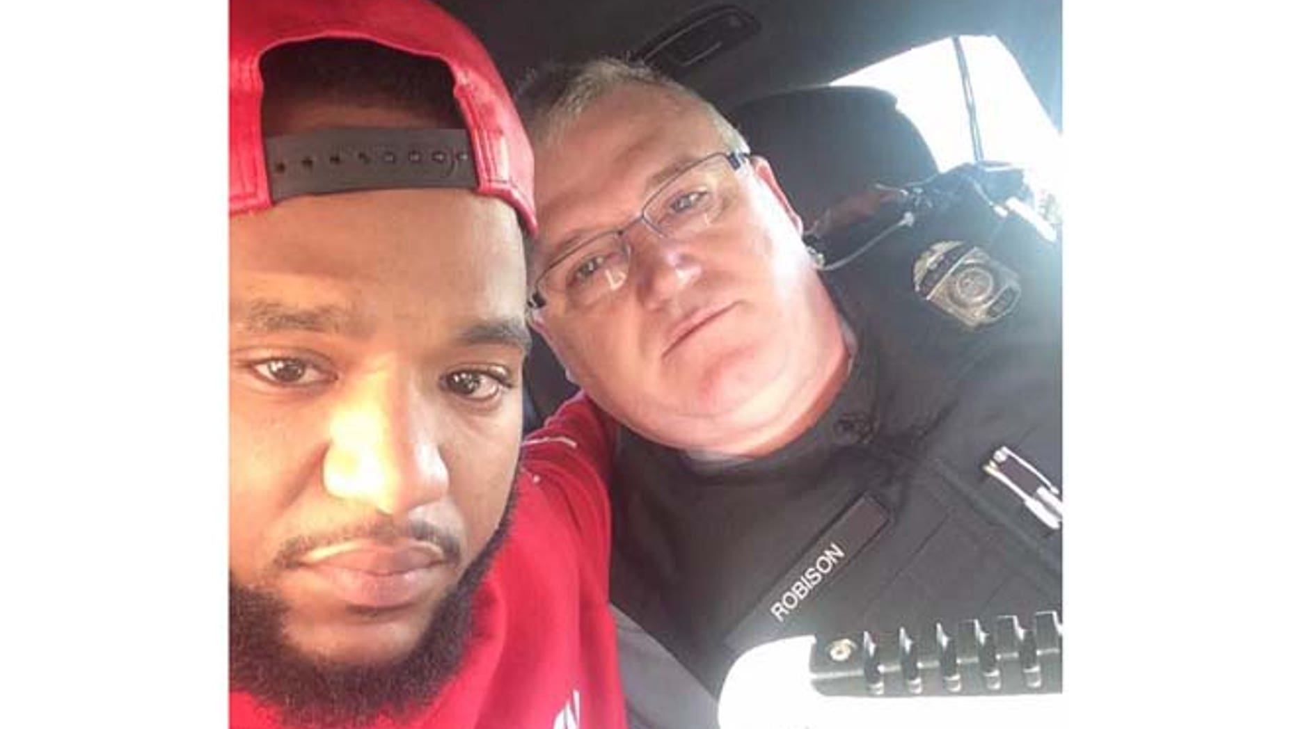 Mark Ross is pictured here in a photo with Sgt. David Robison that was posted to his Facebook page.
