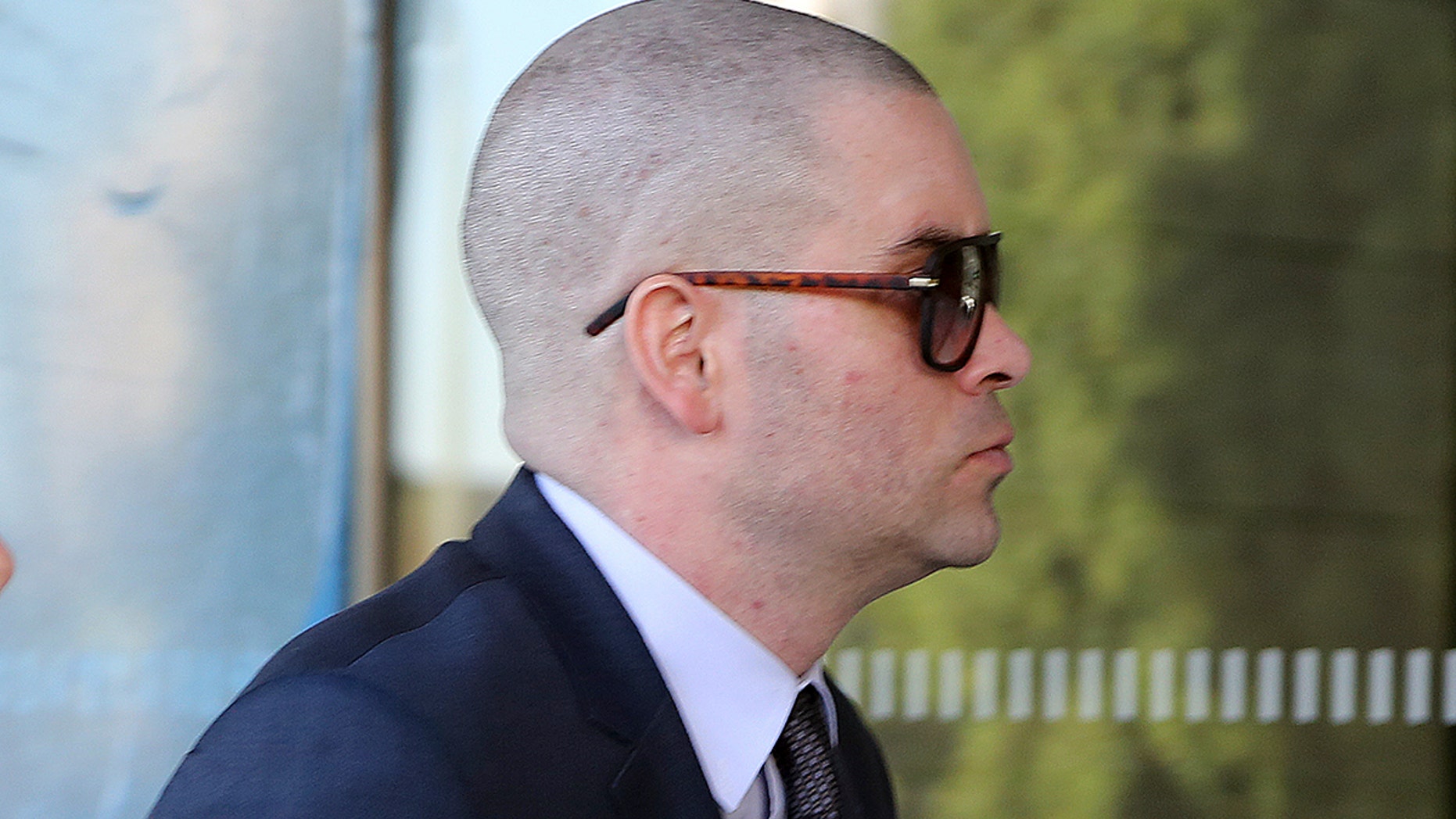 Former "Glee" actor Mark Salling arrives at federal court in Los Angeles on Monday, Dec. 18, 2017. Salling has pleaded guilty to possession of child pornography. (AP Photo/Reed Saxon)
