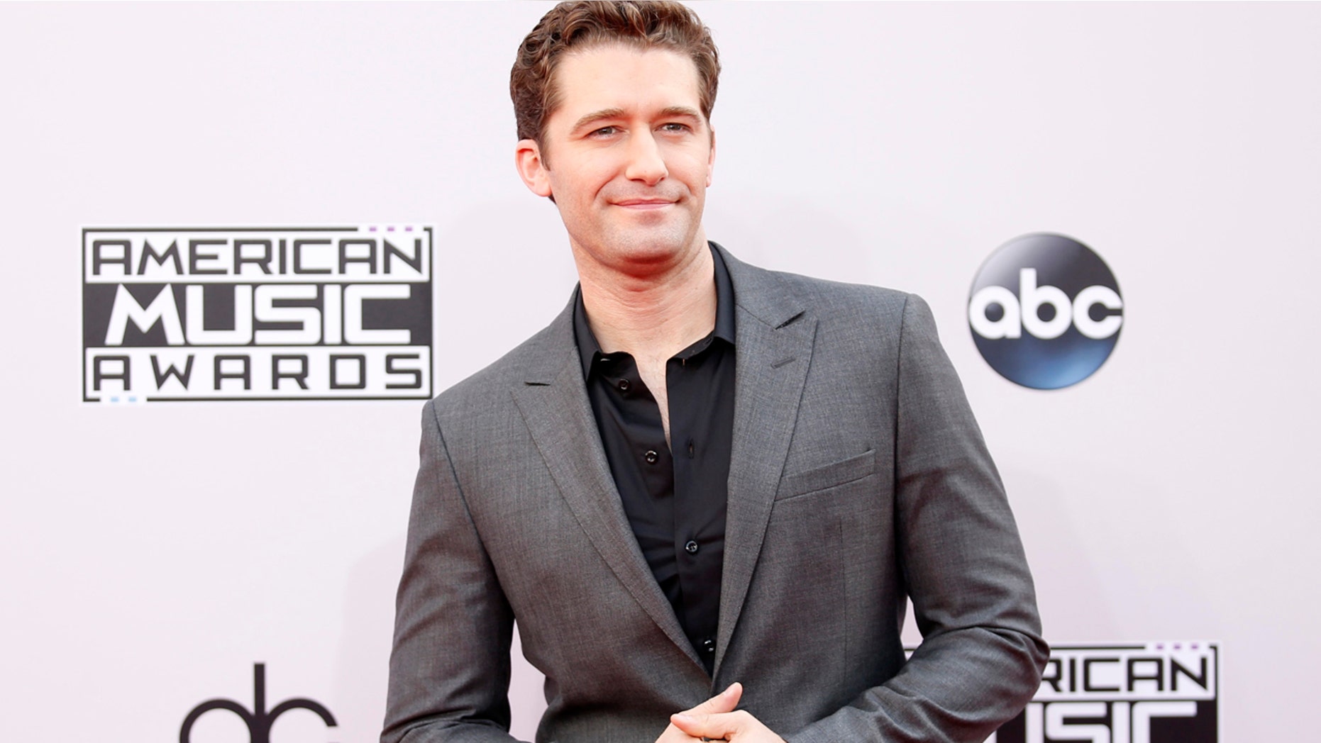 Actor Matthew Morrison arrives at the 42nd American Music Awards in Los Angeles, on Nov. 23, 2014.