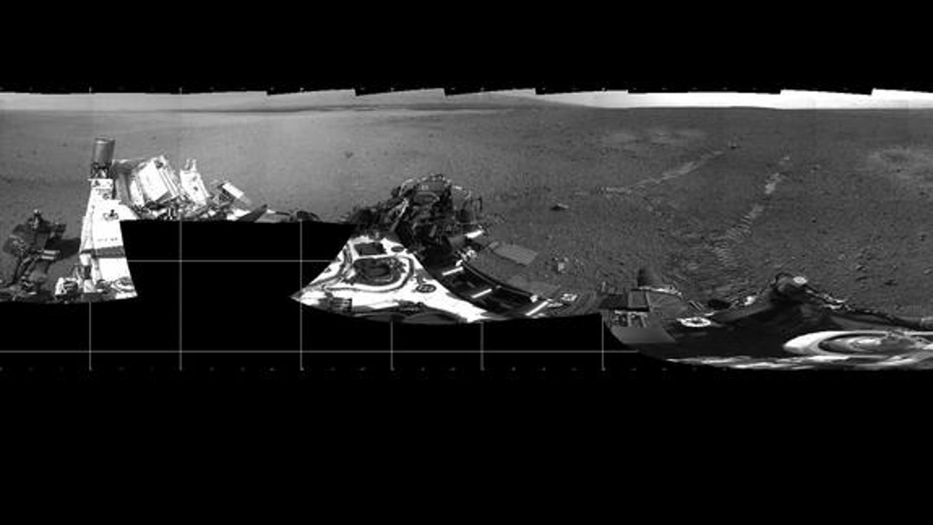 NASA's Mars rover Curiosity took this panorama on Mars on Aug. 22, 2012, just after its first test drive. The landing site has been named "Bradbury Landing" in honor of the late sci-fi author Ray Bradbury.