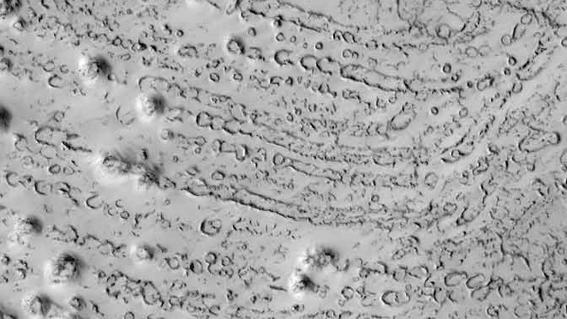 Chains of crater marks on Mars such as these could have been made by icebergs rolling across ancient Martian ocean floors, researchers suggest.