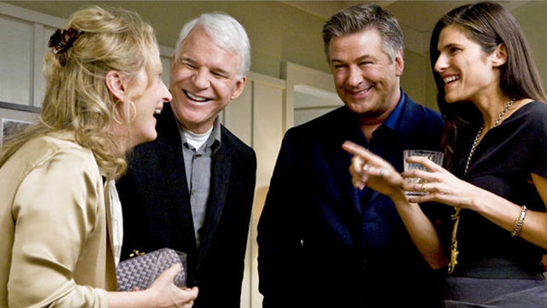 Steve Martin and Alec Baldwin are all smiles in this scene from 'It's Complicated,' but will the pairing work on March 7? (AP)
