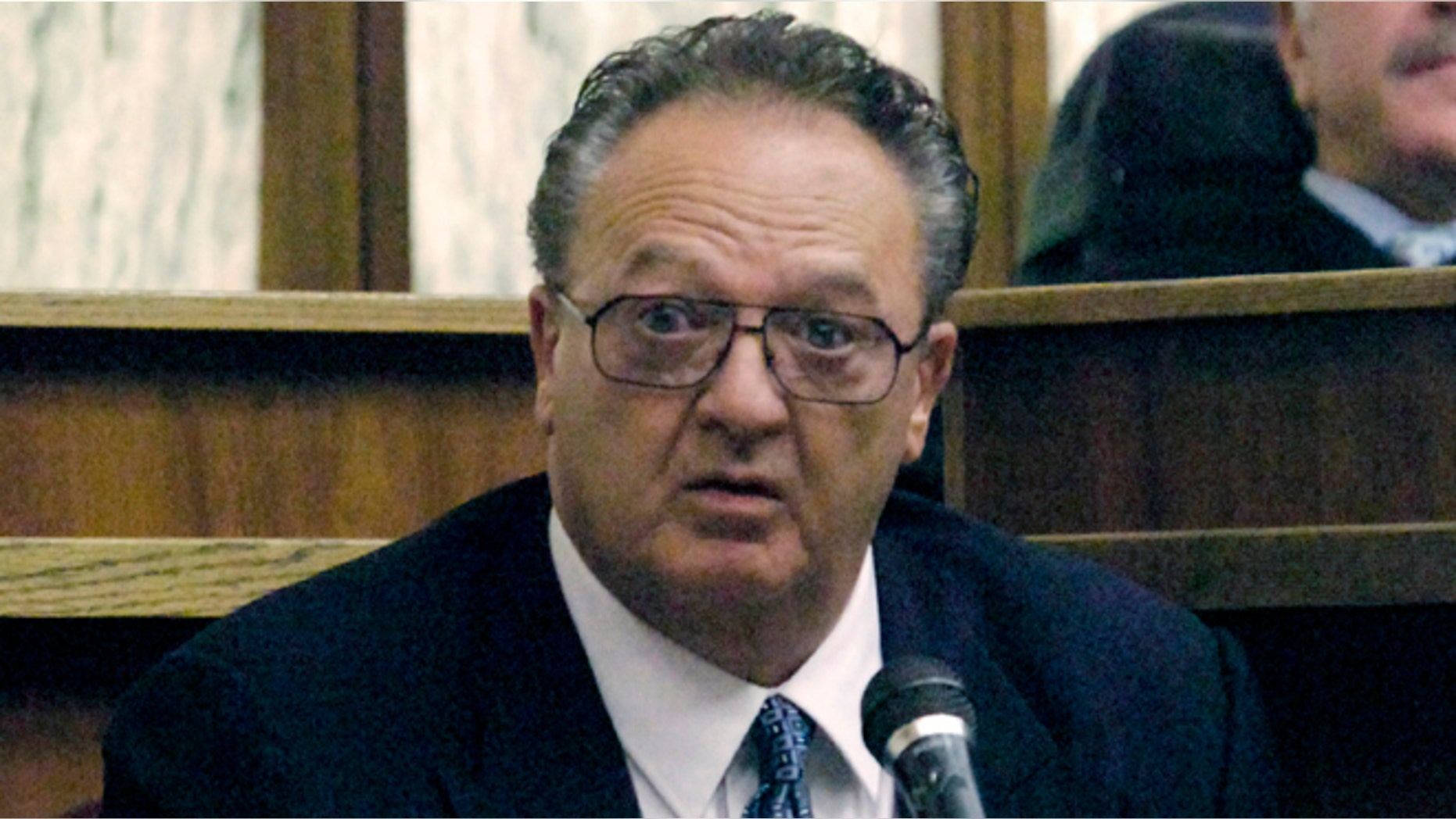 Sept. 17, 2008: John Martorano is questioned about his plea agreement in exchange for testifying against former FBI agent John Connolly, in the Miami Courthouse. Connolly is accused of helping the Boston mob murder Miami gambling executive John Callahan in 1982, at Miami International Airport. Martorano, who served 12 years in prison after a plea deal, and who has admitted killing 20 people, is expected to testify at the trial of James 'Whitey' Bulger in federal court in Boston. (AP/Marice Cohn Band, Pool, File)
