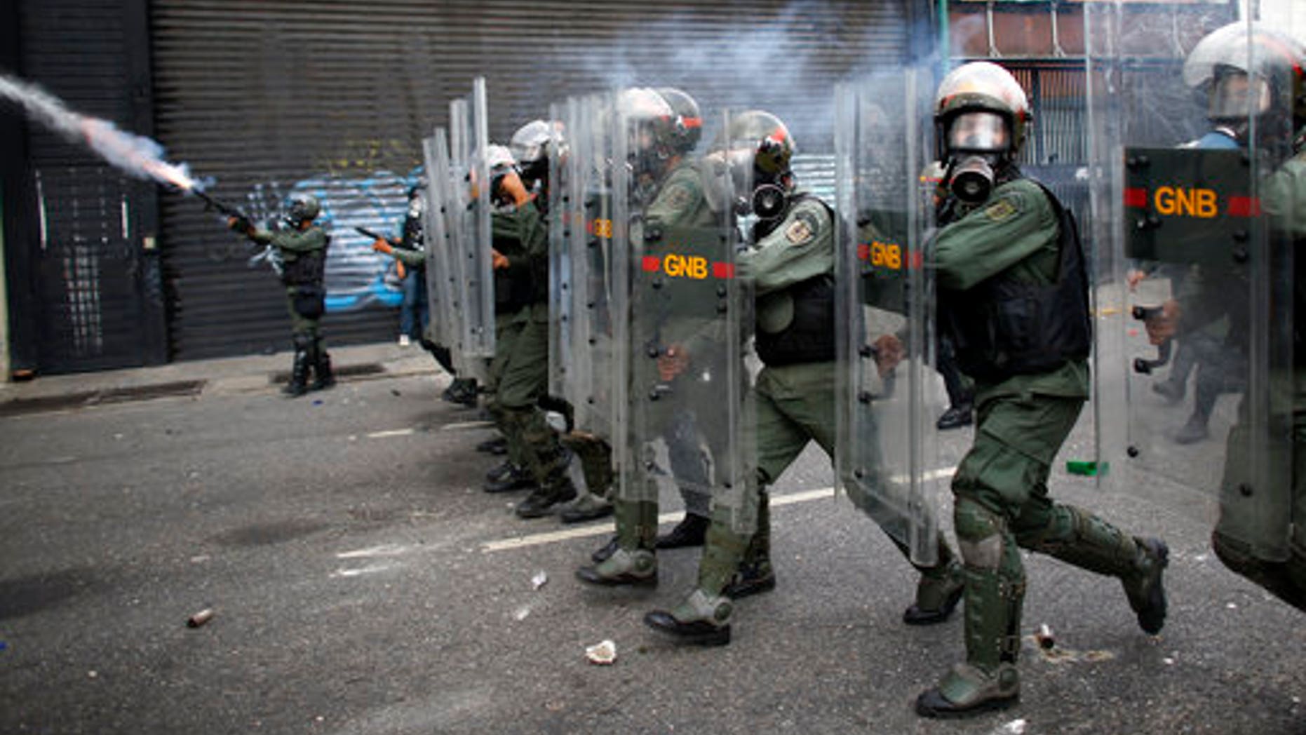 Bolivarian National Guards block protesters from reaching the national ombudsman office in Caracas, Venezuela, April 26, 2017.