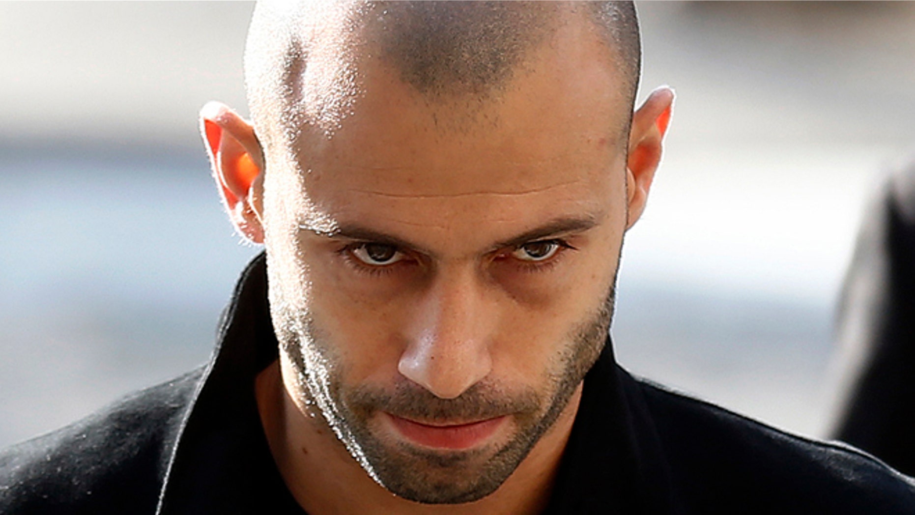 FC Barcelona defender Javier Mascherano, from Argentina, leaves the court after answering questions in a tax fraud case in Barcelona, Spain, Thursday, Jan. 21, 2016. Mascherano has accepted a one-year prison sentence for not properly paying taxes in Spain but is not expected to face any jail time. The sentencing on Thursday came nearly three months after the Barcelona defender had reached a deal with prosecutors and the attorneyÃs office for failing to pay nearly 1.5 million euros ($1.6 million) in taxes for 2011 and 2012. (AP Photo/Manu Fernandez)
