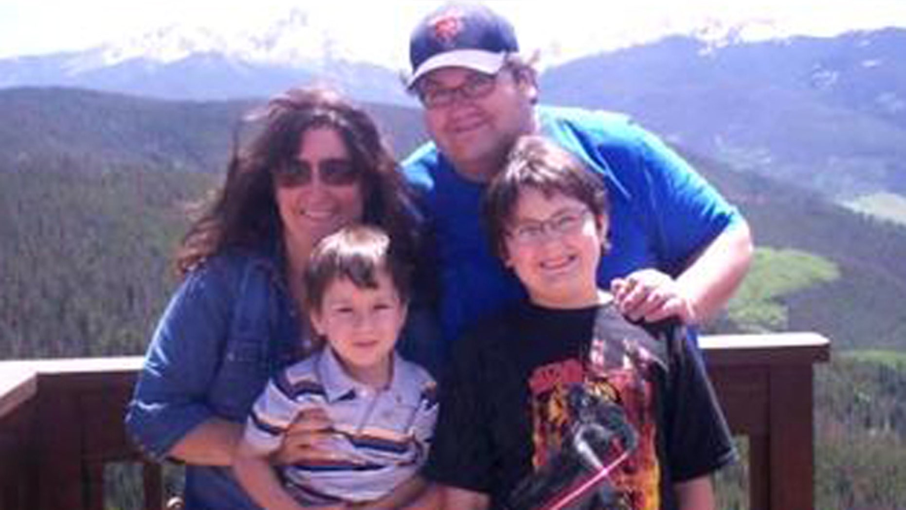 Mason Parrish, front right, with his father, mother and brother.
