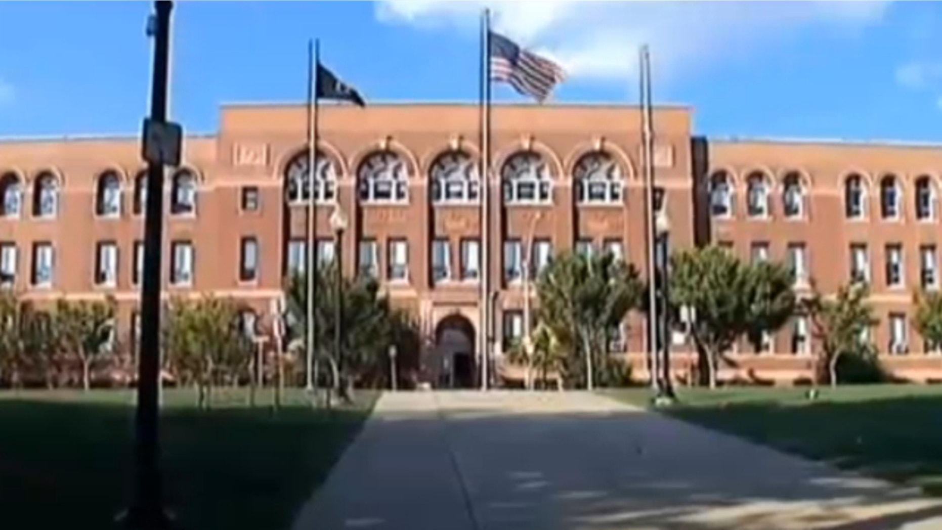 This image shows Somerville High School in Somerville, Mass. Three members of the school's boys’ junior varsity soccer team were arrested on sexual assault charges Friday in connection with an alleged hazing incident at a school sports camp in western Massachusetts.