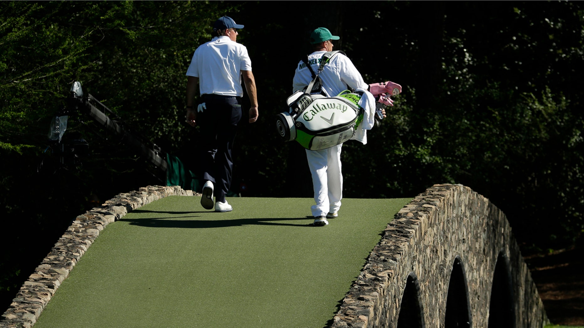 Phil Mickelson walks to the 12th green during the third round of the Masters golf tournament Saturday, April 8, 2017, in Augusta, Ga. (AP Photo/Charlie Riedel)