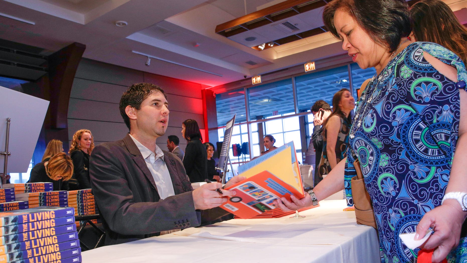 Author Matt De La Pena in a book signing on April 16, 2015 in New York City.