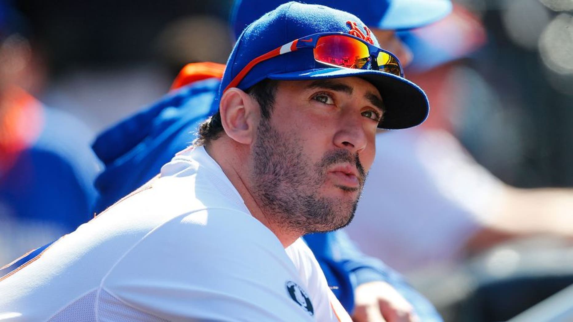 NEW YORK, NY - APRIL 20: Matt Harvey #33 of the New York Mets looks on from the bench during the game against the Atlanta Braves at Citi Field on April 20, 2014 in the Flushing neighborhood of the Queens borough of New York City. Mets defeated the Braves 4-3 in the fourteenth inning. (Photo by Mike Stobe/Getty Images) *** Local Caption *** Matt Harvey