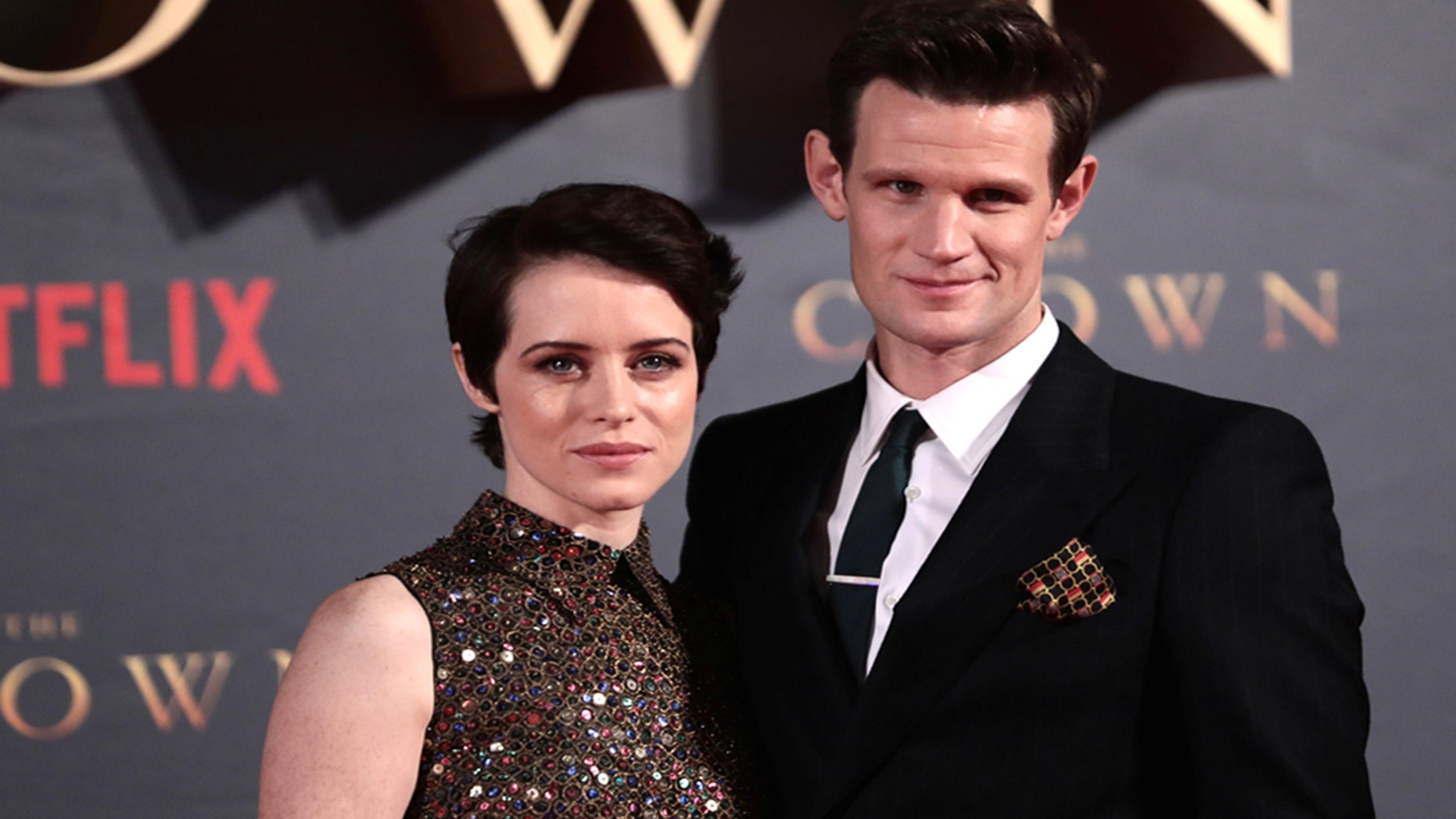 Actors Claire Foy, who plays Queen Elizabeth II, and Matt Smith who plays Philip Duke of Edinburgh, attend the premiere of "The Crown" Season 2 in London, Britain, November 21, 2017. REUTERS/Simon Dawson - RC111B38EA60