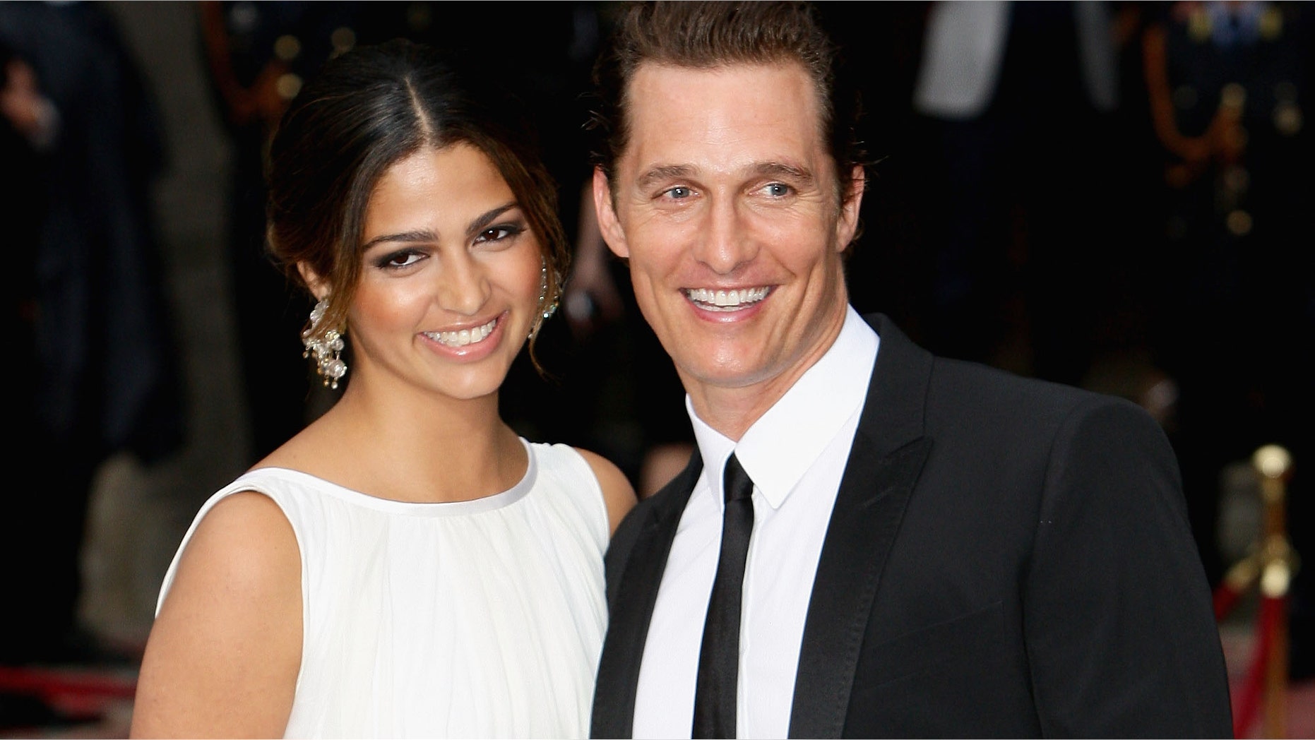 MILAN, ITALY - JUNE 19: Camila Alves and Matthew McConaughey attend the Dolce & Gabbana "20 Years of Menswear" during Milan Fashion Week Spring/Summer 2011 on June 19, 2010 in Milan, Italy. (Photo by Vittorio Zunino Celotto/Getty Images)