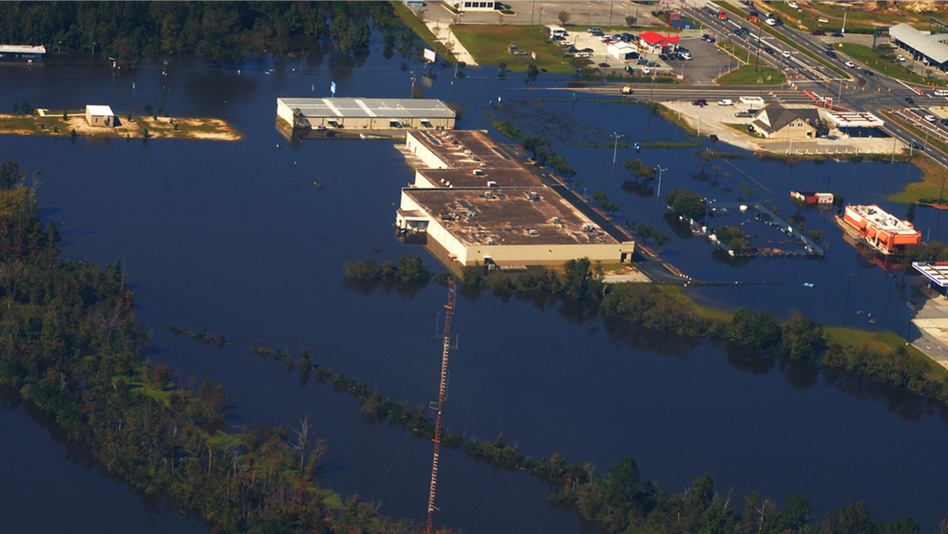 Oct. 12, 2016: Water flows across Highway 11 South near Skinner's Bypass after Hurricane Matthew.
