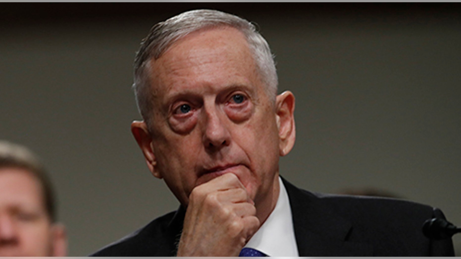 Defense Secretary Jim Mattis listens on Capitol Hill in Washington. Mattis is issuing his own sharp threat to North Korea, saying the regime should cease any consideration of actions that would "lead to the end of its regime and the destruction of its people."