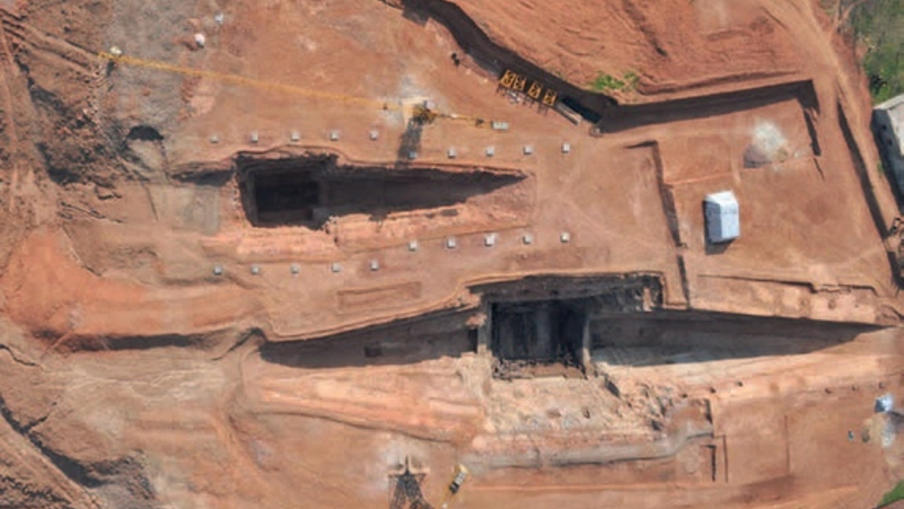 Archaeologists in China have discovered a mausoleum, dating back over 2,100 years, that contains three main tombs, including the tomb of Liu Fei (shown at bottom), the ruler of the Jiangdu kingdom in China.