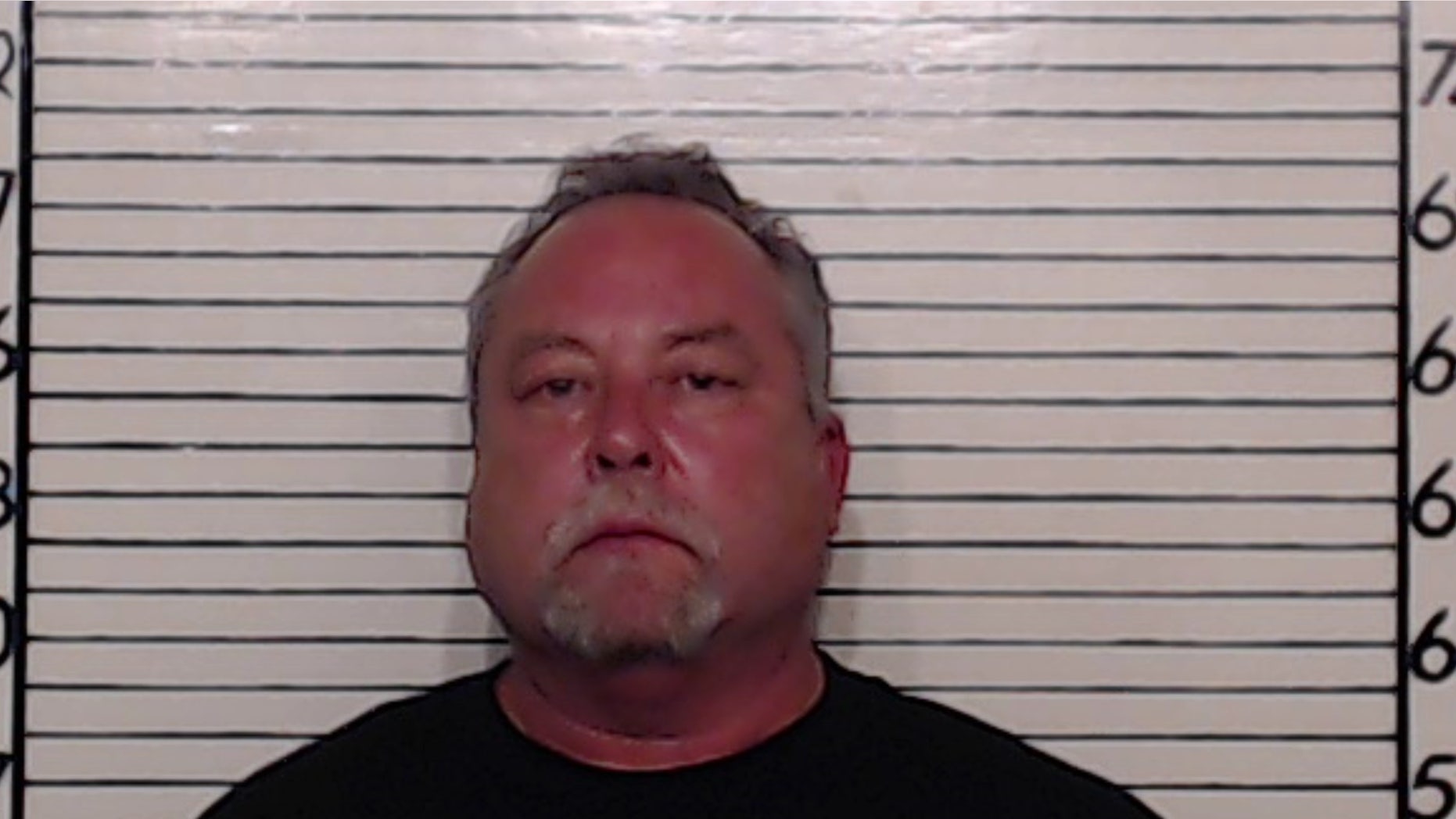 This mugshot shows Brett Mauthe, 55, after his arrest for electioneering.