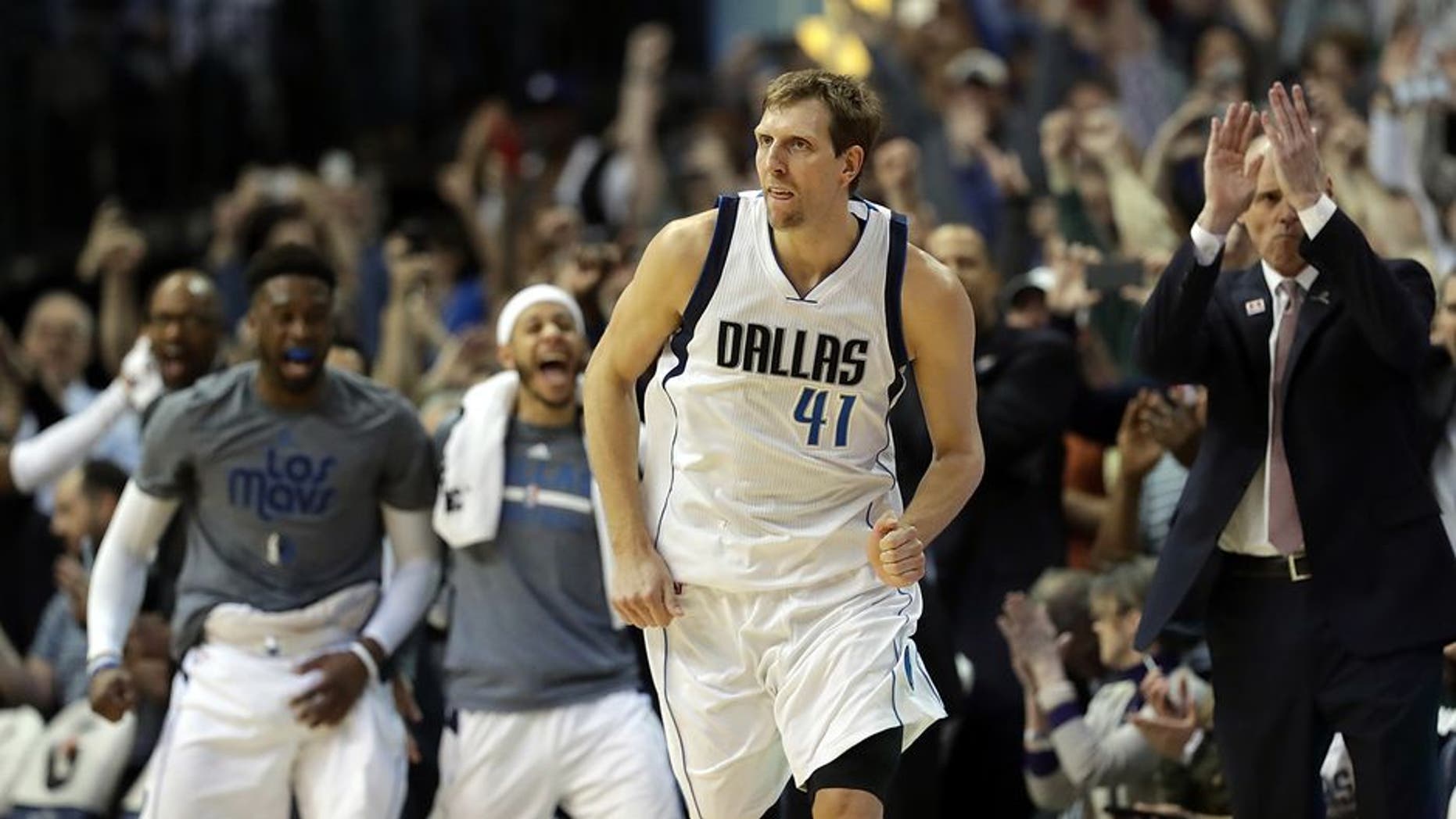 DALLAS, TX - MARCH 07: Dirk Nowitzki #41 of the Dallas Mavericks runs down court after scoring his 30,000 career point in the second quarter against the Los Angeles Lakers at American Airlines Center on March 7, 2017 in Dallas, Texas. NOTE TO USER: User expressly acknowledges and agrees that, by downloading and/or using this photograph, user is consenting to the terms and conditions of the Getty Images License Agreement. (Photo by Ronald Martinez/Getty Images)
