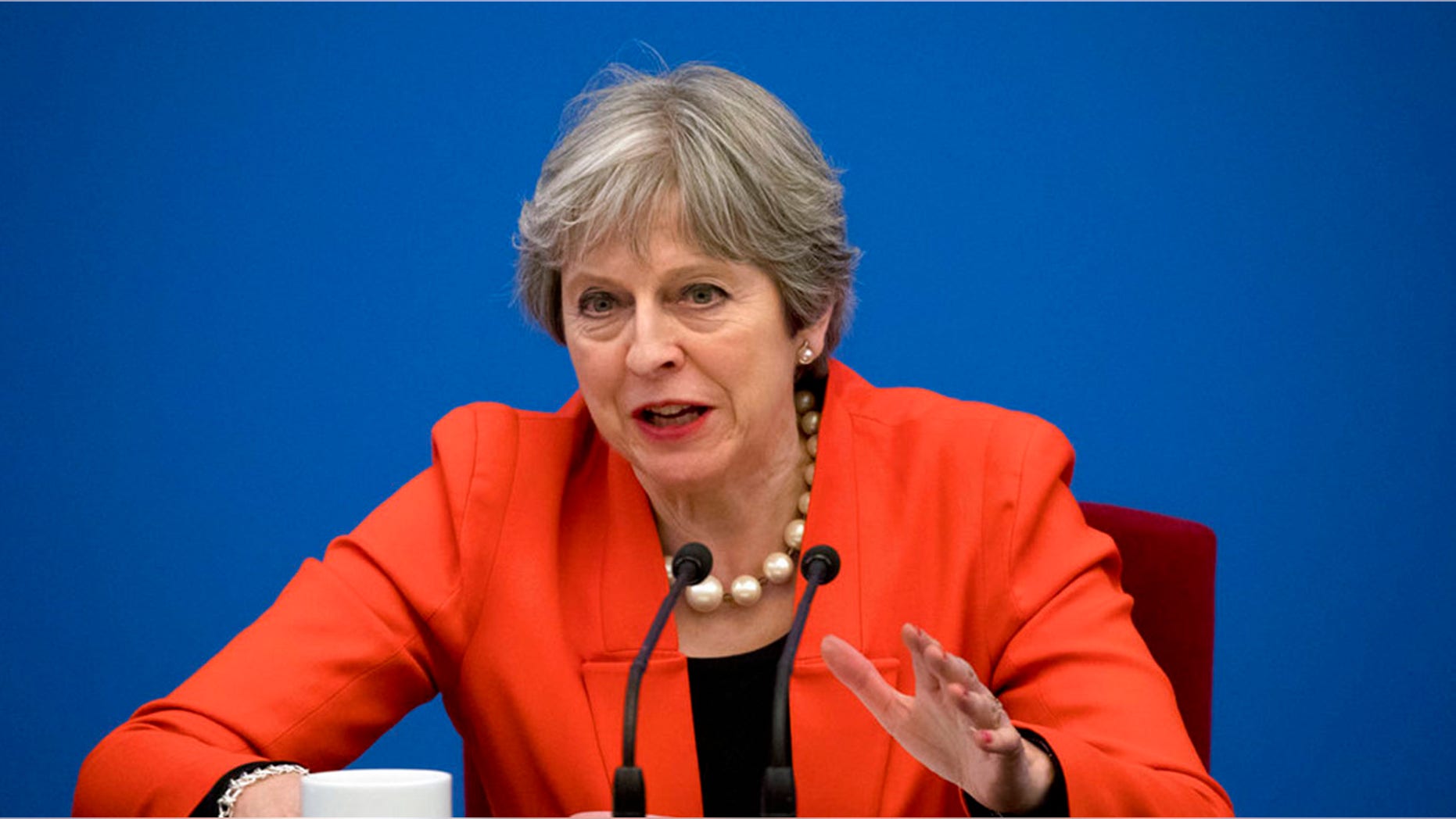 Prime Minister Theresa May has called for Corbyn to be "open and transparent" about his dealings with a Czech spy.