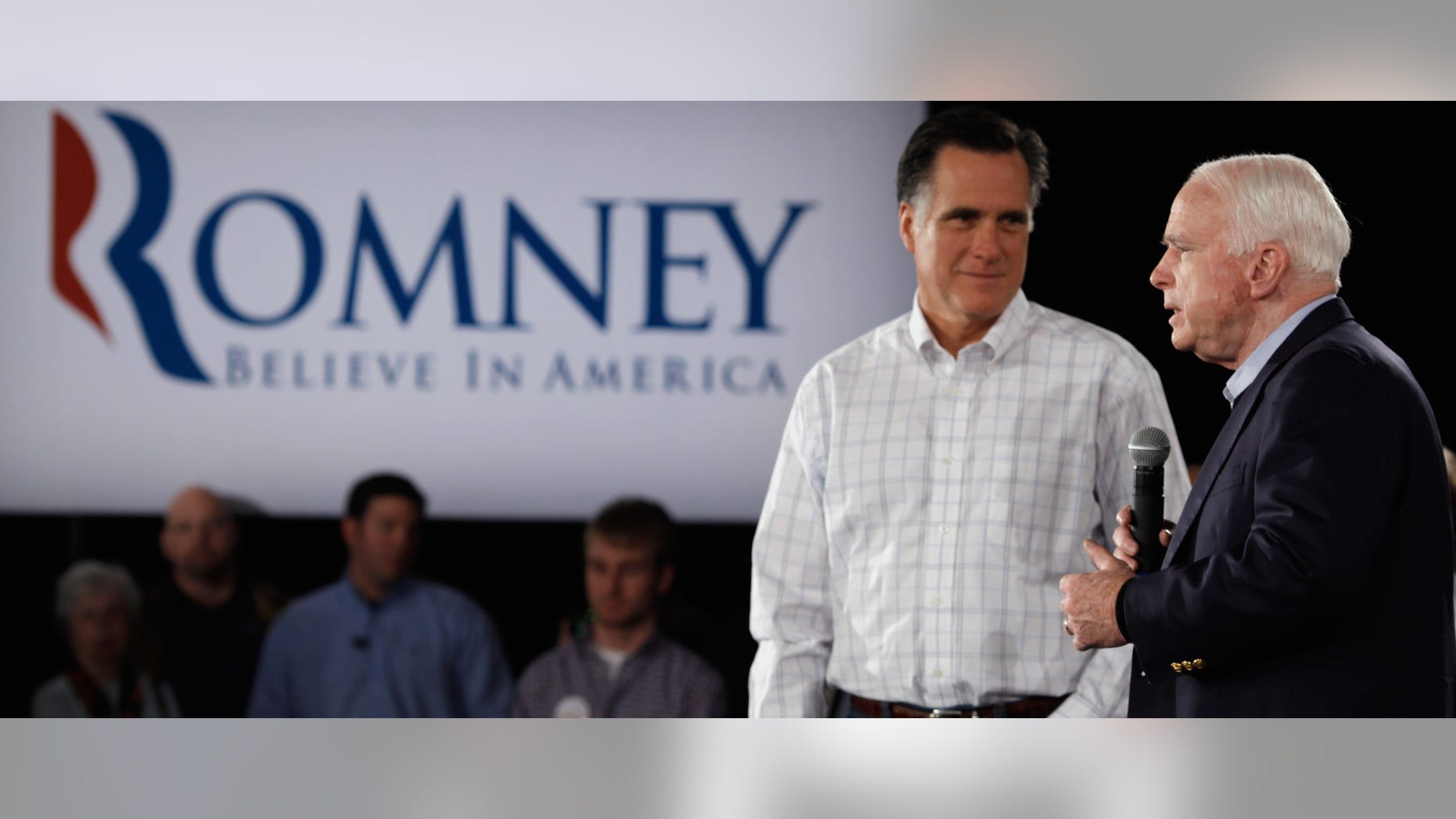SALEM, NH - JANUARY 05: Republican presidential candidate, former Massachusetts Governor Mitt Romney (L) and Sen. John McCain (R-AZ) hold a campaign town hall meeting at the Boys and Girls Club January 5, 2012 in Salem, New Hampshire. McCain, the GOP presidential nominee who ran against President Barack Obama in 2008, endorsed Romney on Wednesday. Romney eeked out an eight-vote victory in the Iowa Caucuses against former U.S. Senator Rick Santorum, who is also stumping in New Hampshire. (Photo by Chip Somodevilla/Getty Images)
