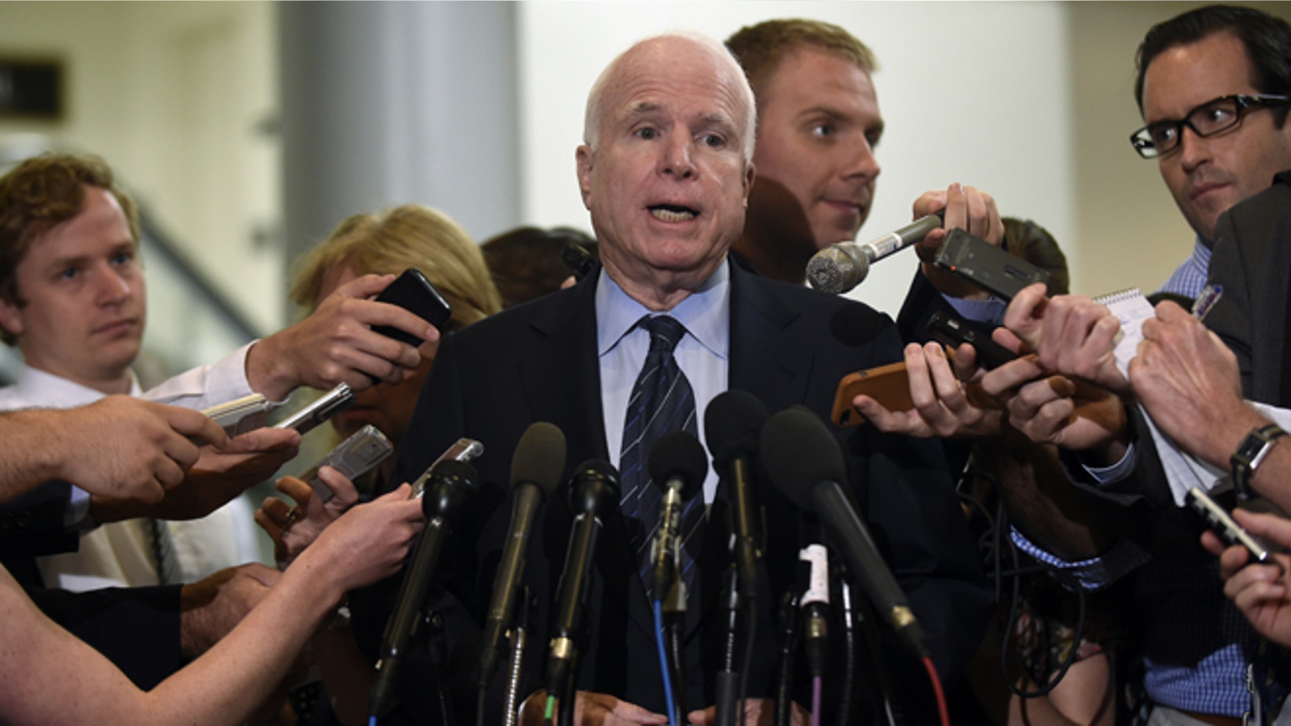 July 8, 2014: Sen. John McCain, R-Ariz., speaks to reporters on Capitol Hill in Washington.