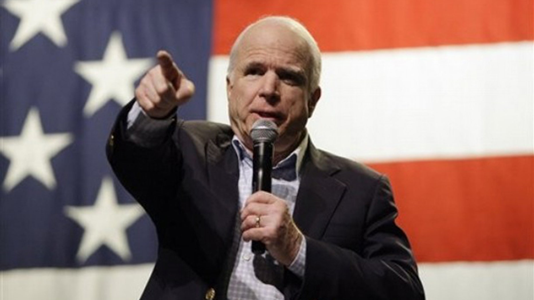 Sen. John McCain answers a question at a town hall meeting June 4 in Mesa, Ariz. (AP Photo)