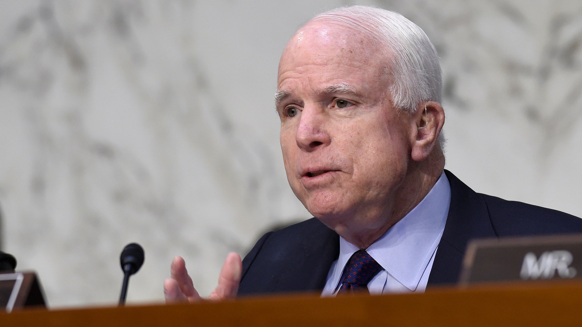 Senate Armed Services Committee Chairman Sen. John McCain, R-Ariz., asks questions of Defense Undersecretary Frank Kendall, the military's chief weapons buyer, and Air Force Secretary Deborah Lee James, during a hearing on Capitol Hill in Washington, Wednesday, Jan. 27, 2016, on Russian-made rockets for military satellites. (AP Photo/Susan Walsh)
