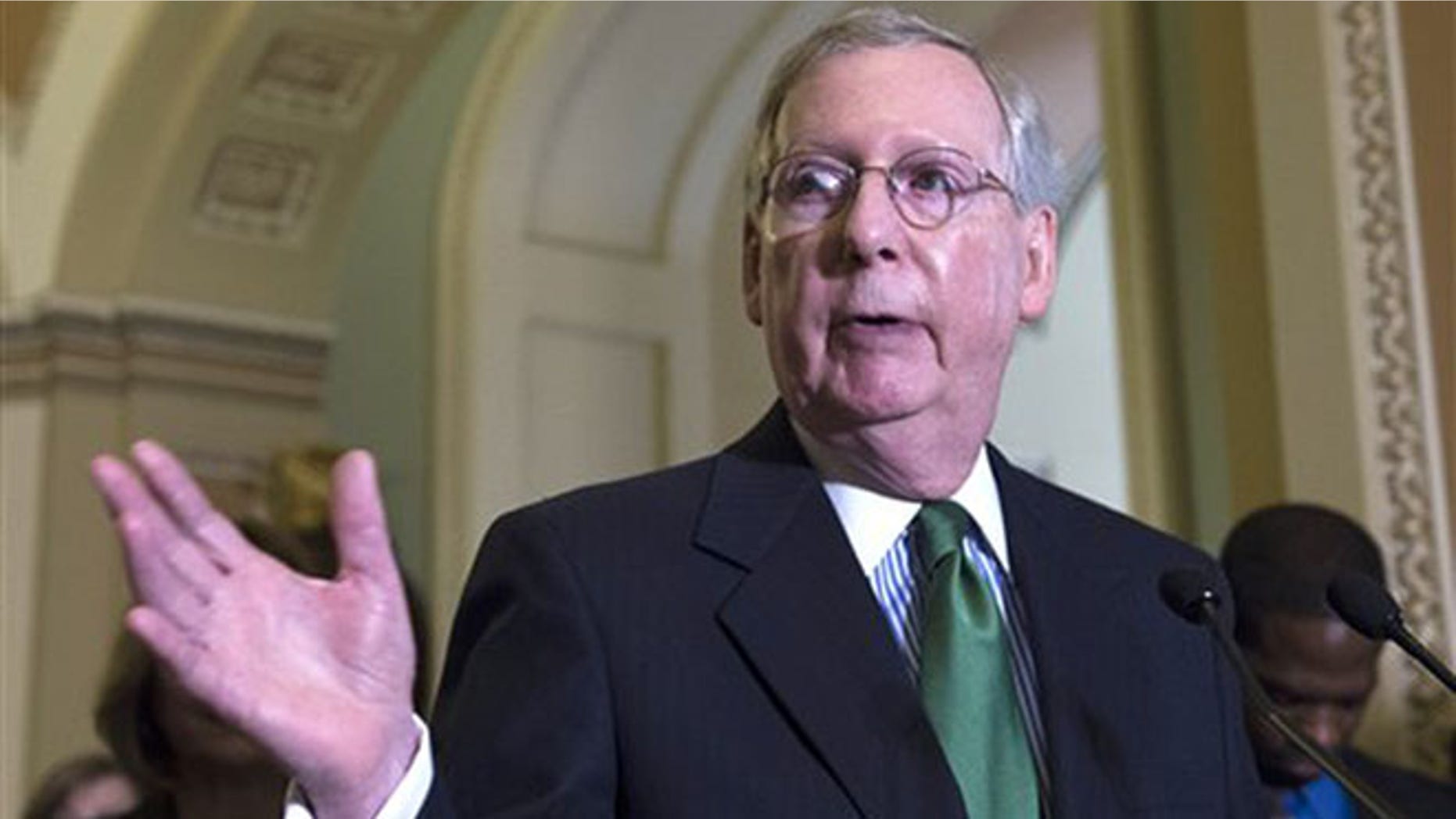 FILE - In this June 9, 2015 file photo, Senate Majority Leader Mitch McConnell of Ky. speaks during a news conference on Capitol Hill in Washington. Congressional Republicans are poised to deal a sharp blow to their traditional allies in the business community by allowing the federal Export-Import Bank to go out of business at the end of the month. But it may only be temporary. (AP Photo/Molly Riley, File)