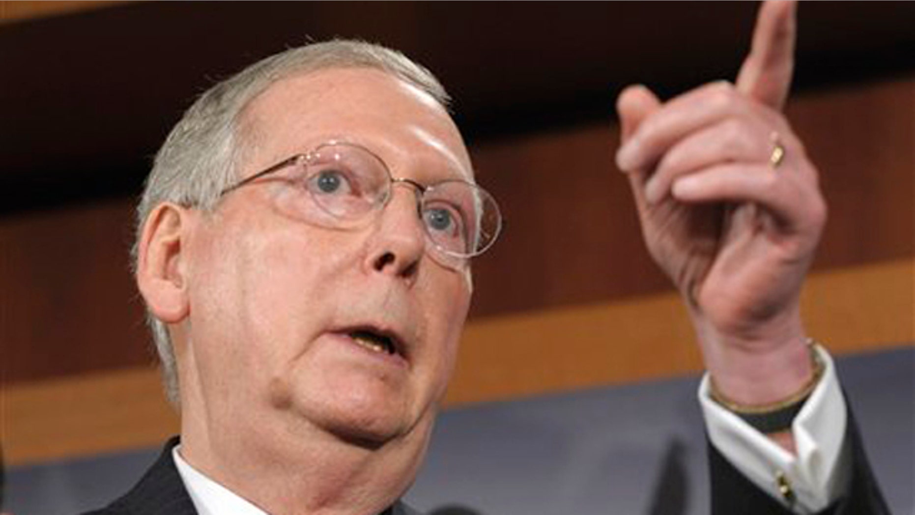 July 12: Senate Minority Leader Mitch McConnell gestures during a news conference on Capitol Hill.