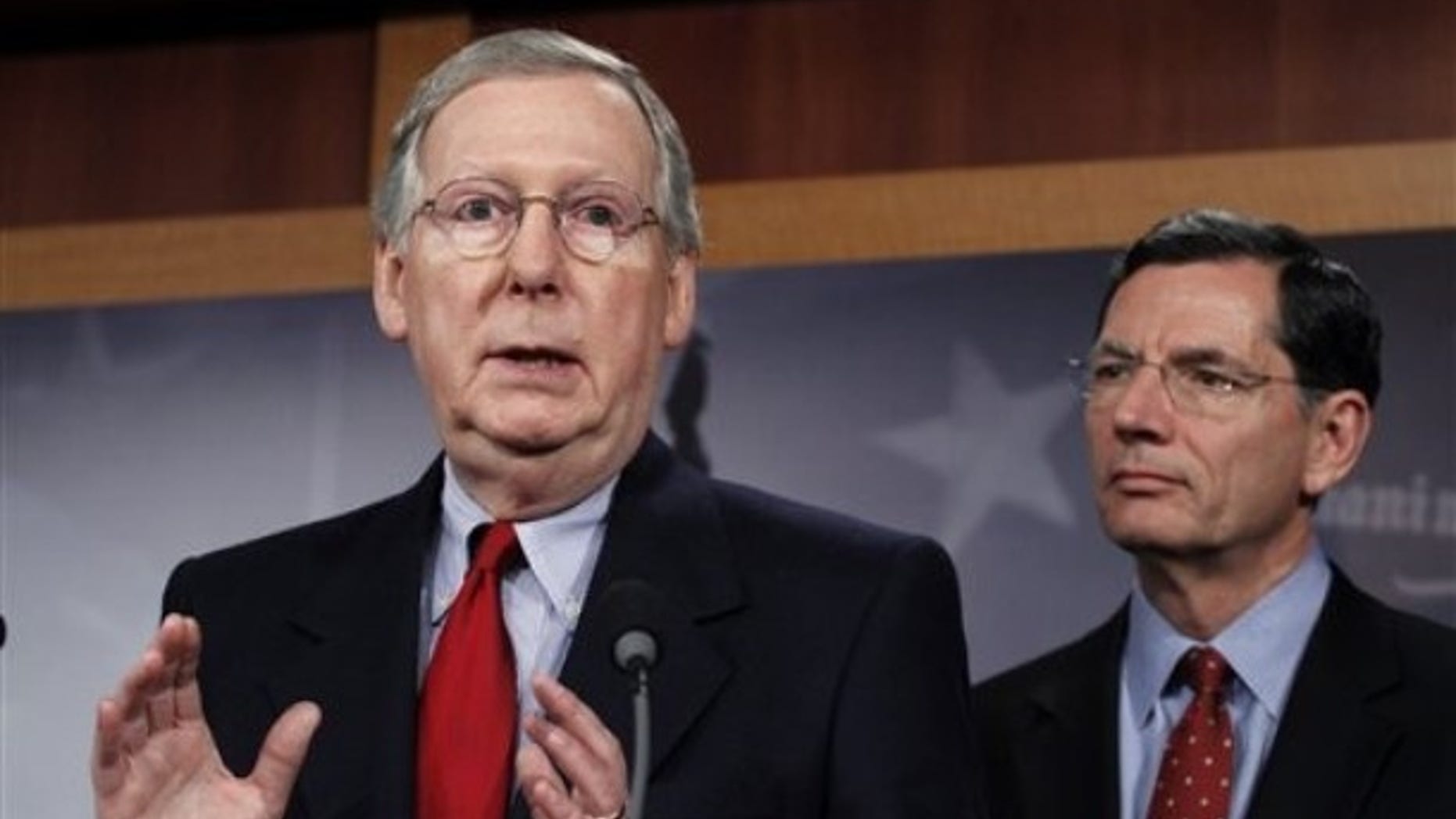 Nov. 3: Senate Minority Leader Mitch McConnell, R-Ky., speaks and Sen. John Barrasso, R-Wyo., listens during a rare weekend session of the U.S. Senate.